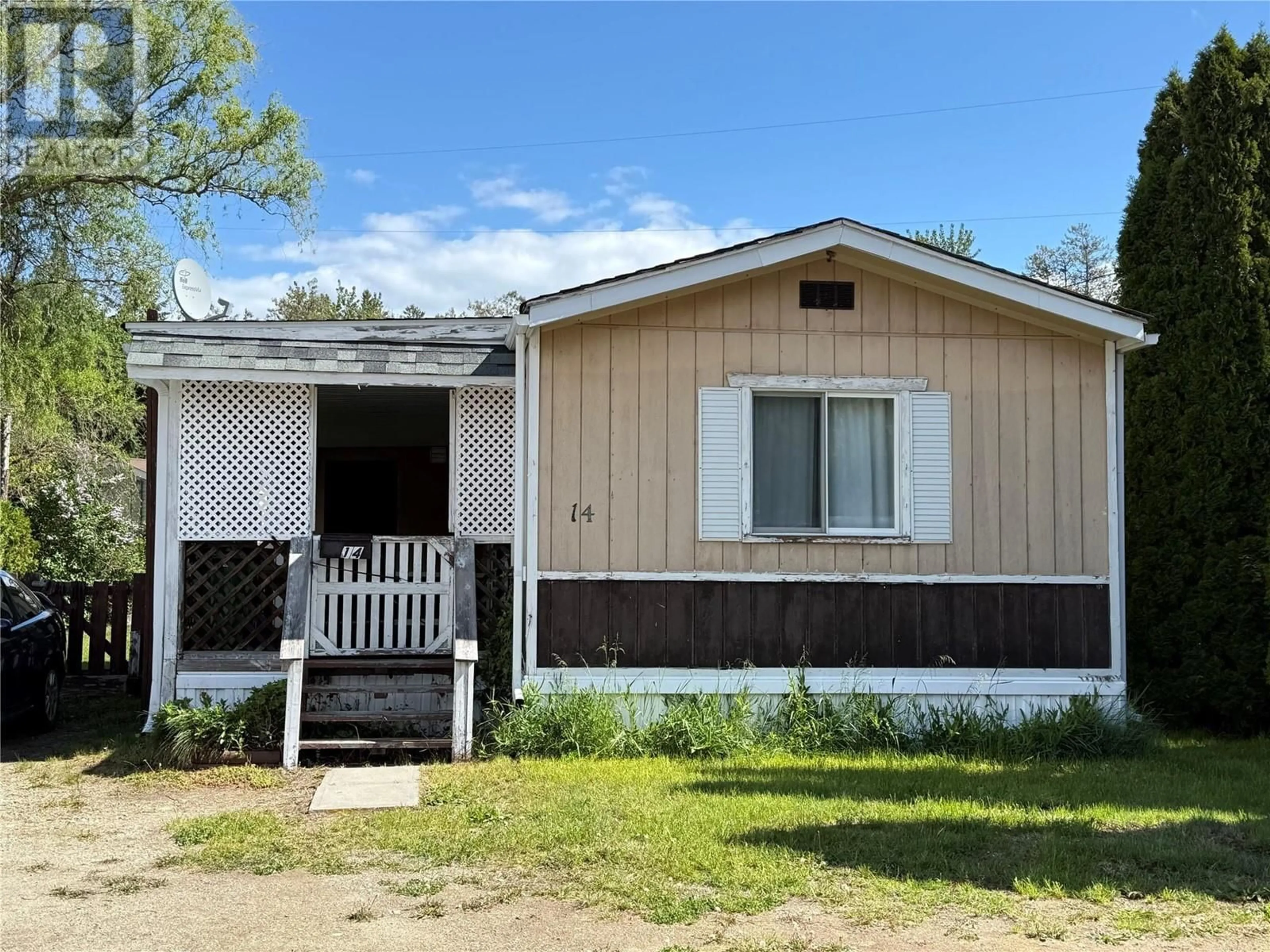 Home with vinyl exterior material, street for 500 16TH AVENUE, Genelle British Columbia V0G1L0