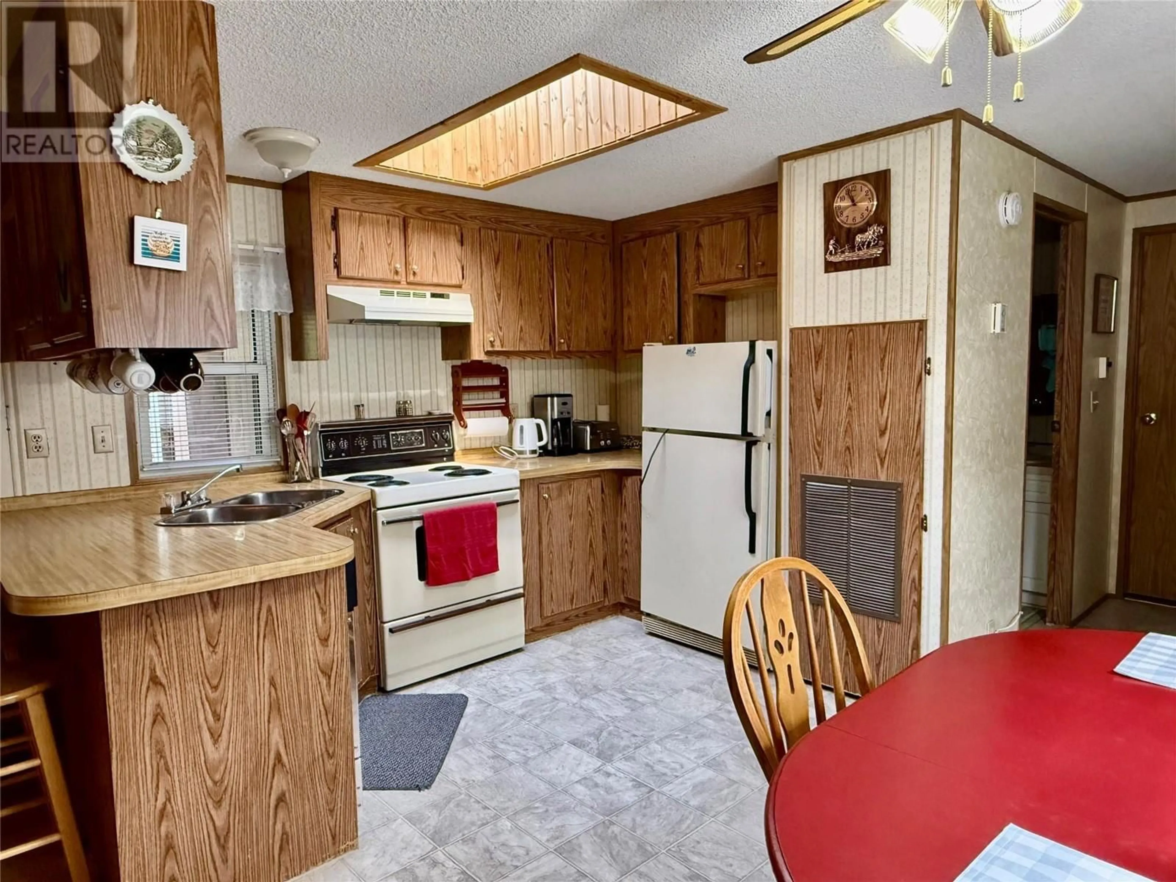 Standard kitchen, unknown for 500 16TH AVENUE, Genelle British Columbia V0G1L0