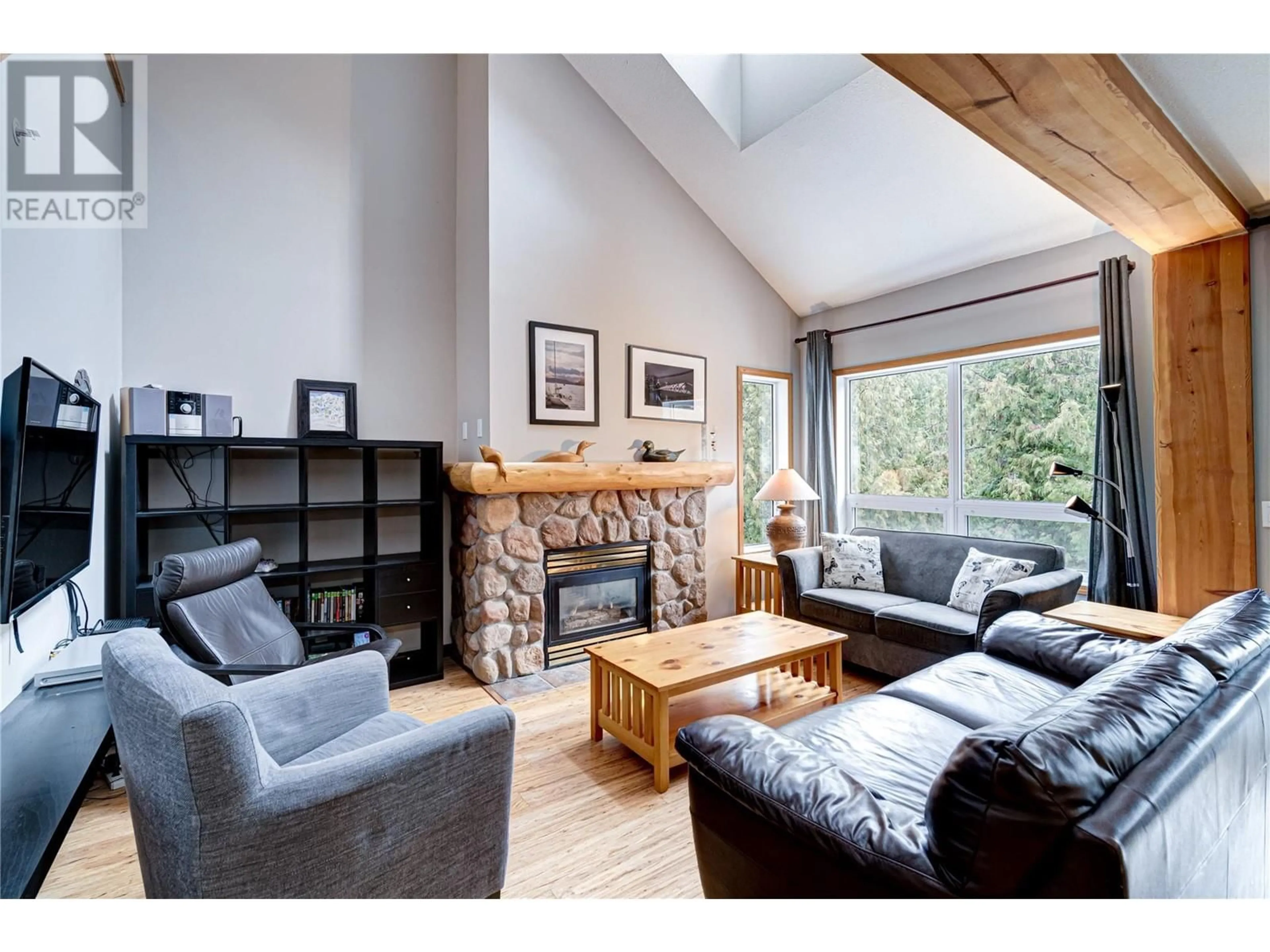 Living room with furniture, wood/laminate floor for 4 - 5423 BOOMERANG WAY, Fernie British Columbia V0B1M6