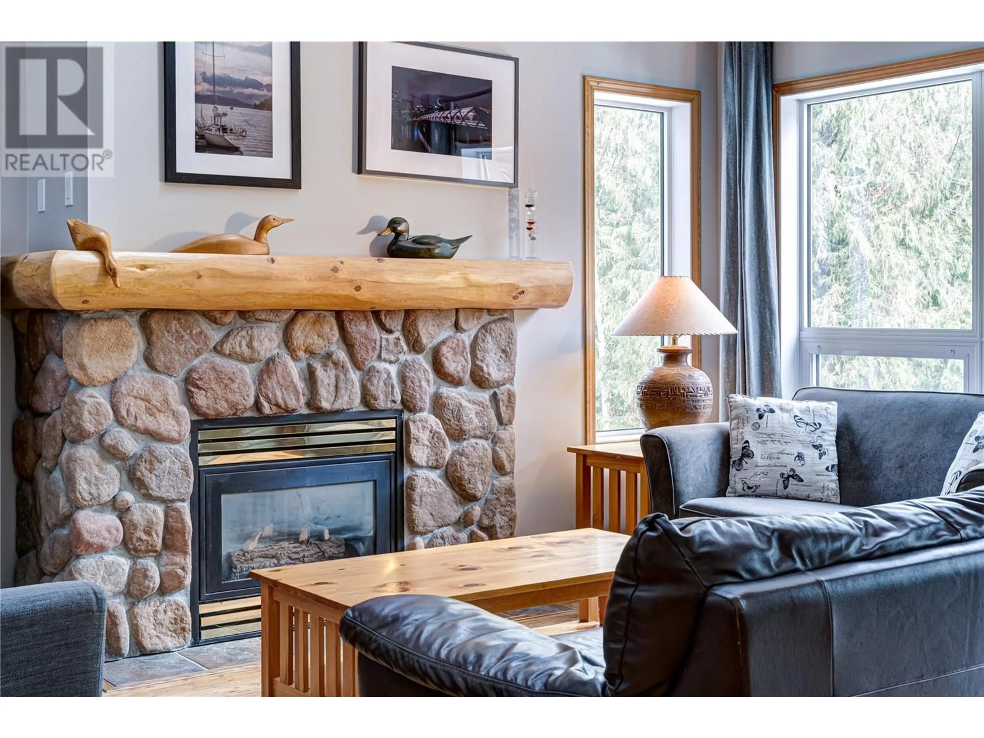 Living room with furniture, wood/laminate floor for 4 - 5423 BOOMERANG WAY, Fernie British Columbia V0B1M6