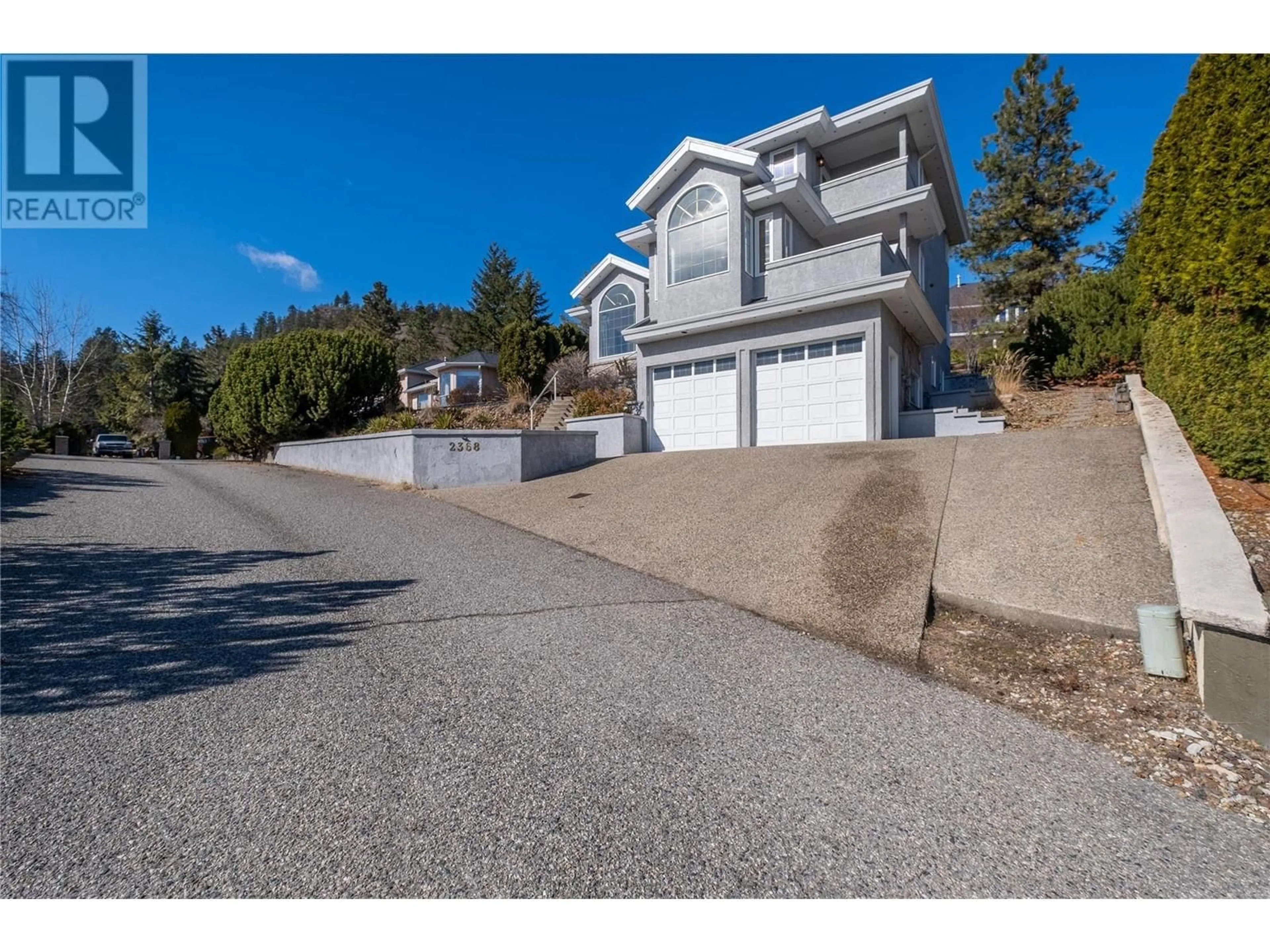A pic from outside/outdoor area/front of a property/back of a property/a pic from drone, street for 2368 NAHANNI COURT, Kelowna British Columbia V1V1N1