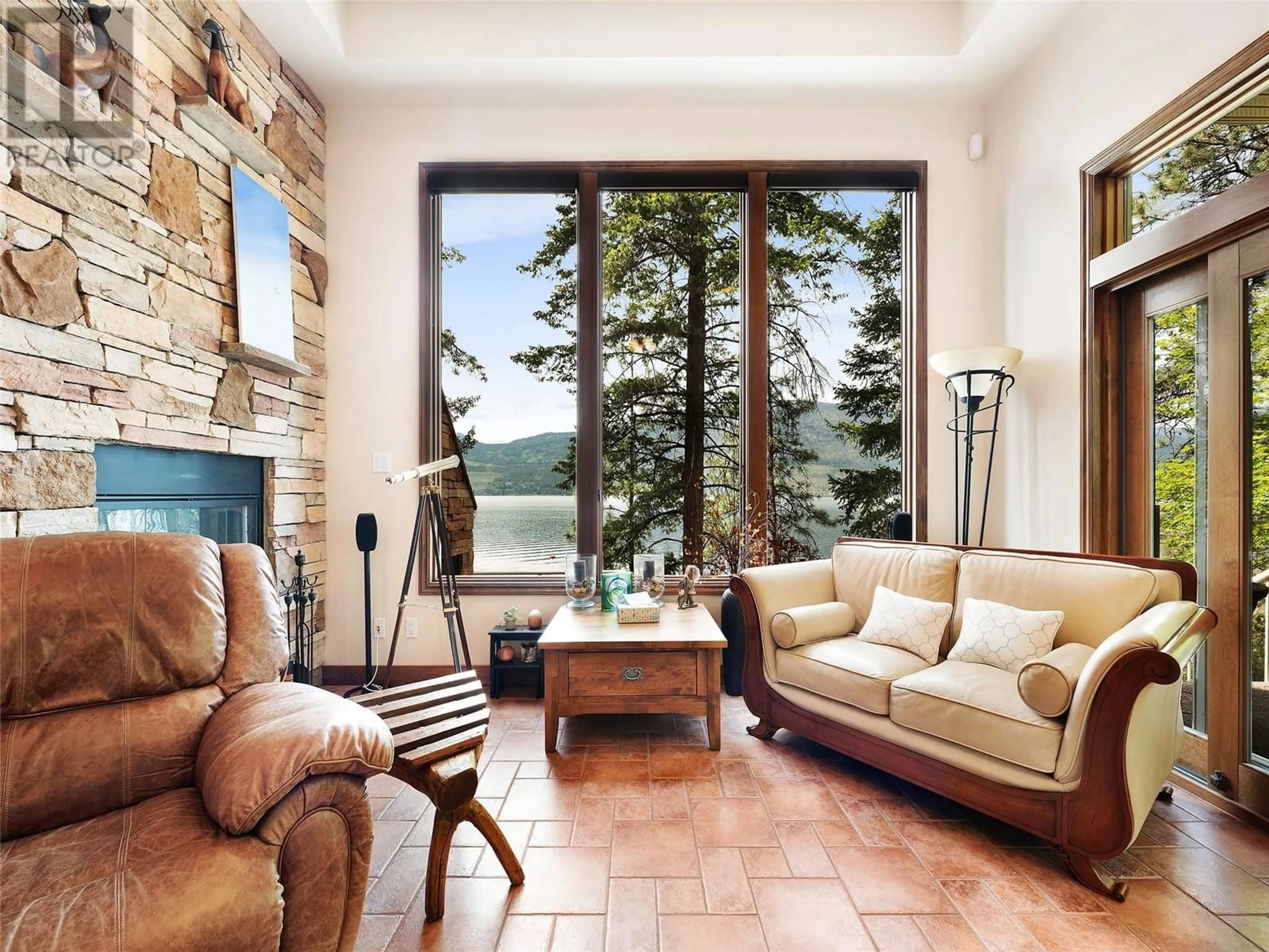 Living room with furniture, ceramic/tile floor for 9 - 9900 EASTSIDE ROAD, Vernon British Columbia V1H1L6