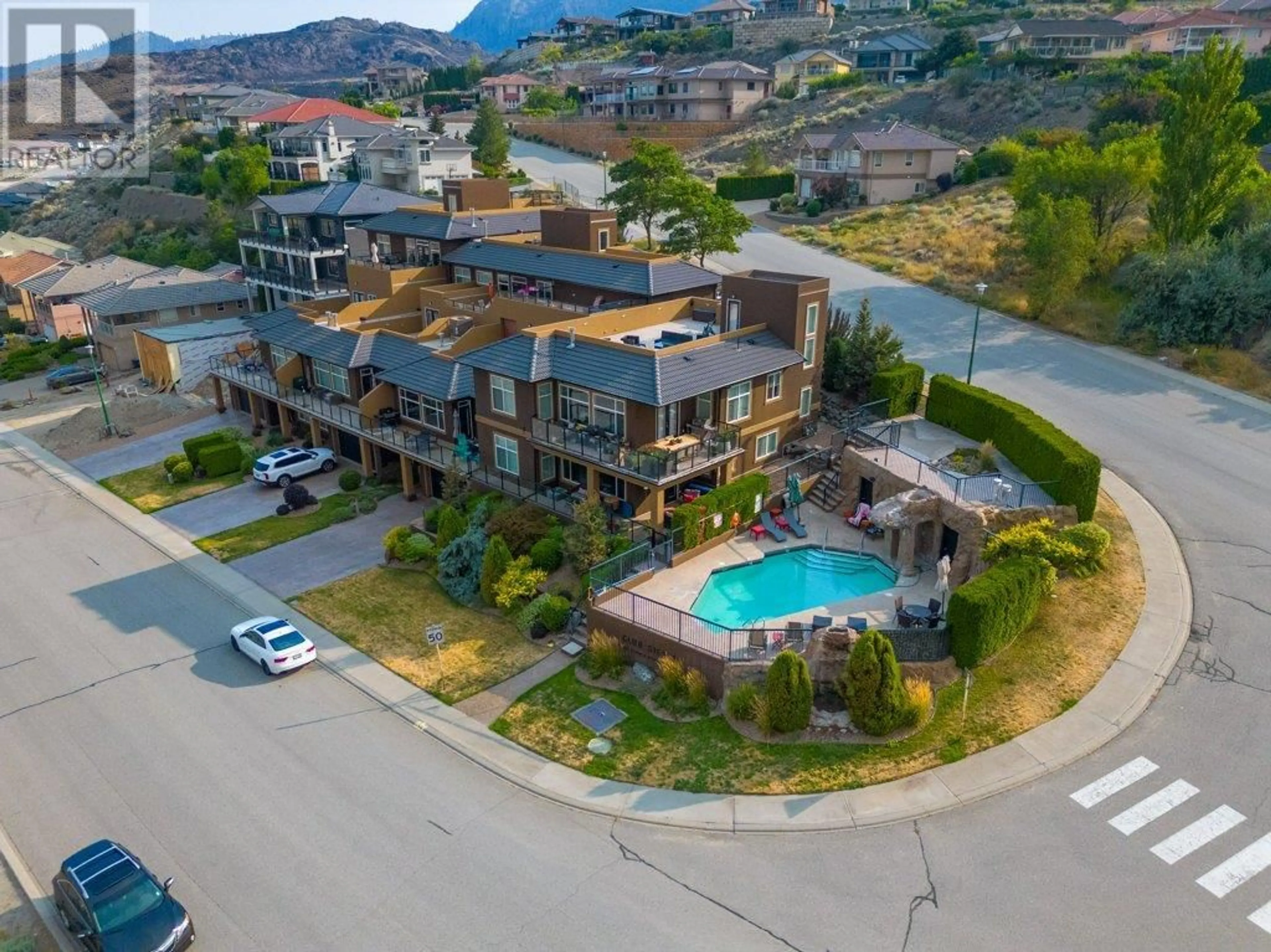 A pic from outside/outdoor area/front of a property/back of a property/a pic from drone, mountain view for 4216 GOLF COURSE DRIVE, Osoyoos British Columbia V0H1V4