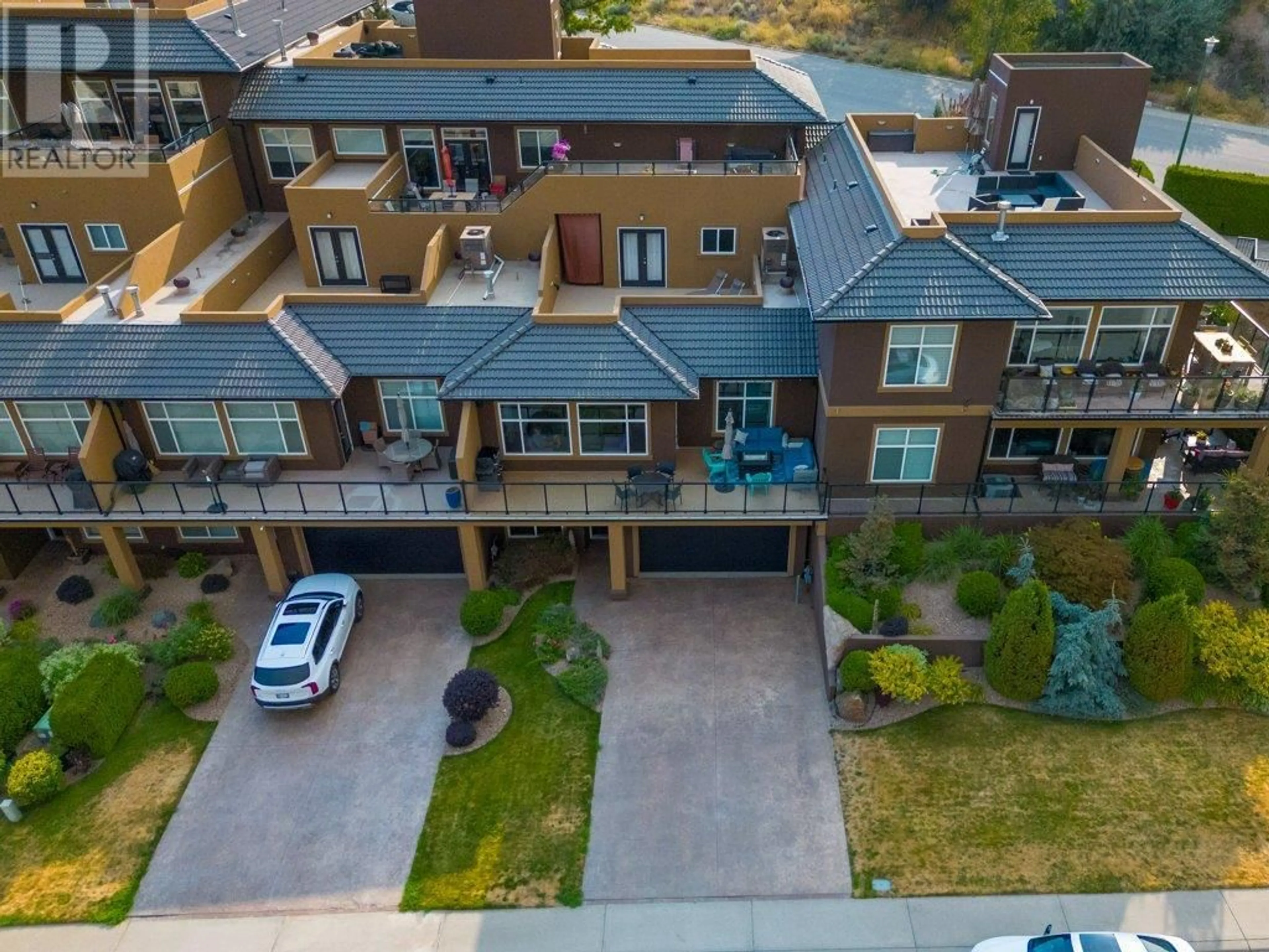 A pic from outside/outdoor area/front of a property/back of a property/a pic from drone, street for 4216 GOLF COURSE DRIVE, Osoyoos British Columbia V0H1V4
