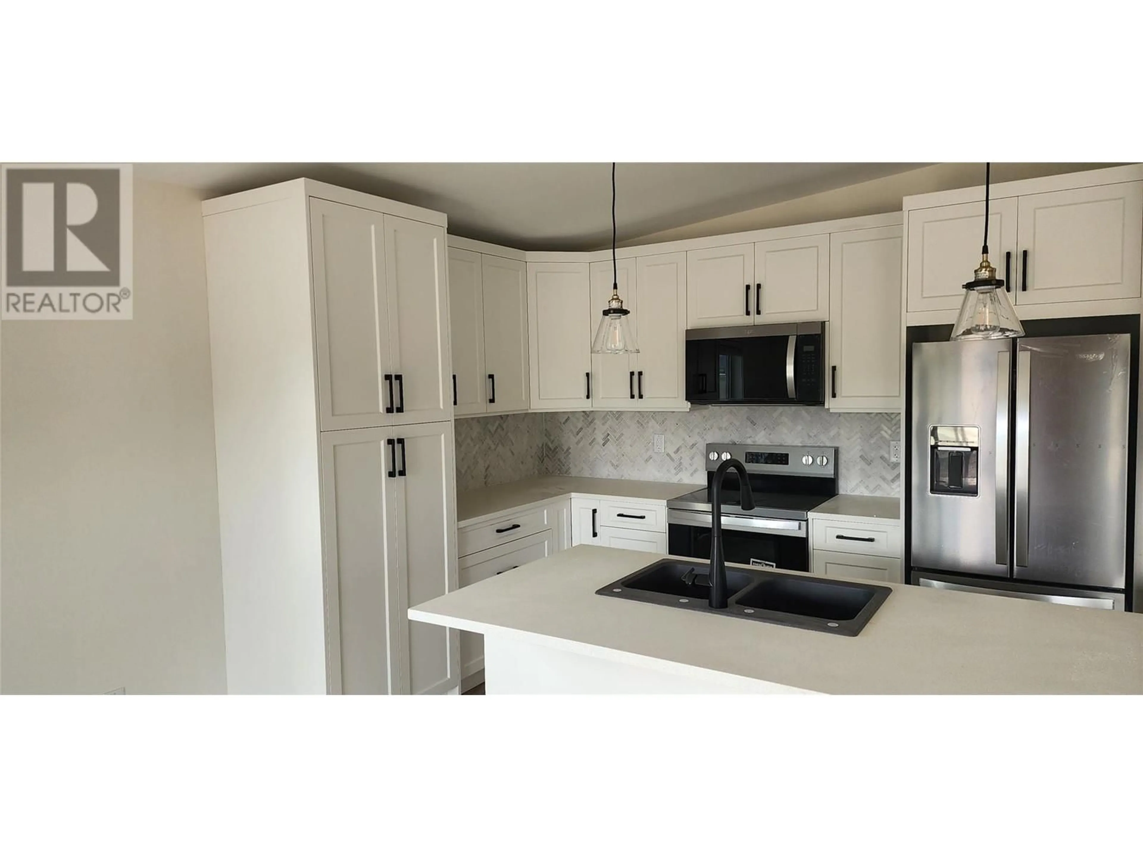 Open concept kitchen, ceramic/tile floor for 6830 22ND STREET, Grand Forks British Columbia V0H1H0