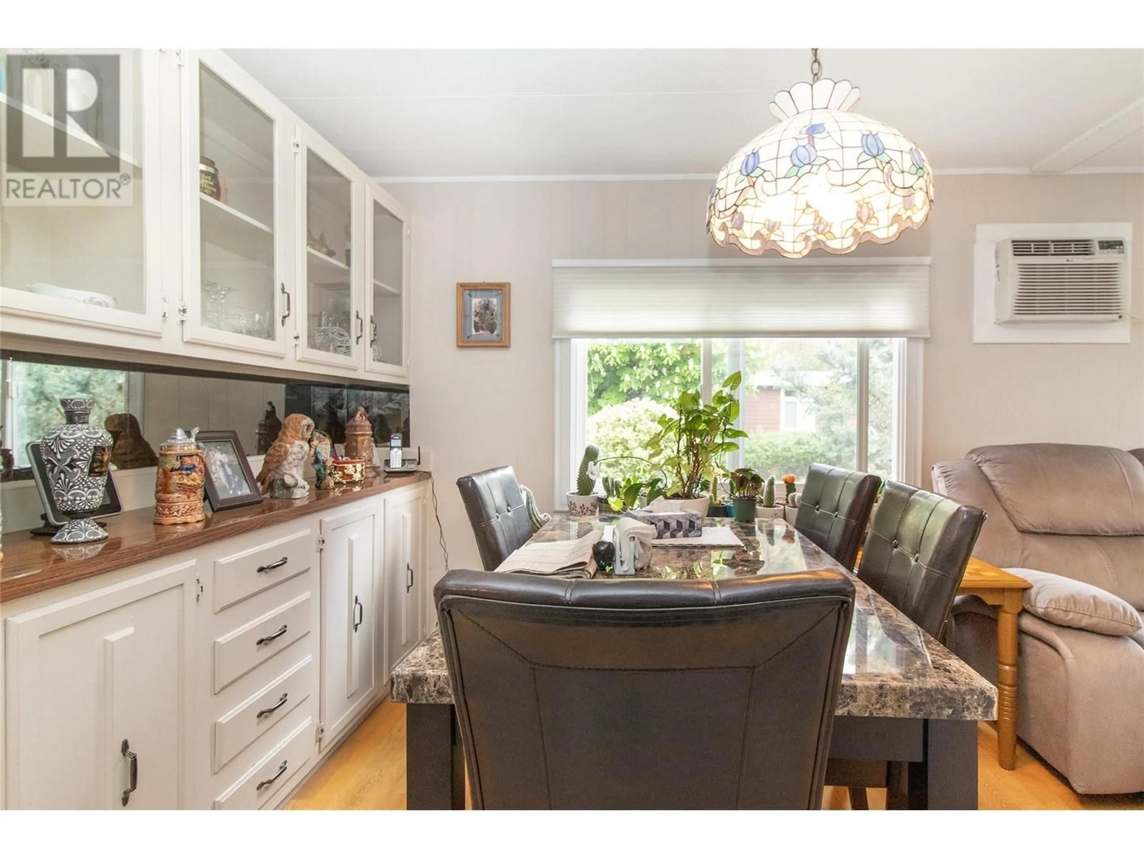 Dining room, wood/laminate floor for 22 - 5432 CHIDLEY ROAD, Peachland British Columbia V0H1X5