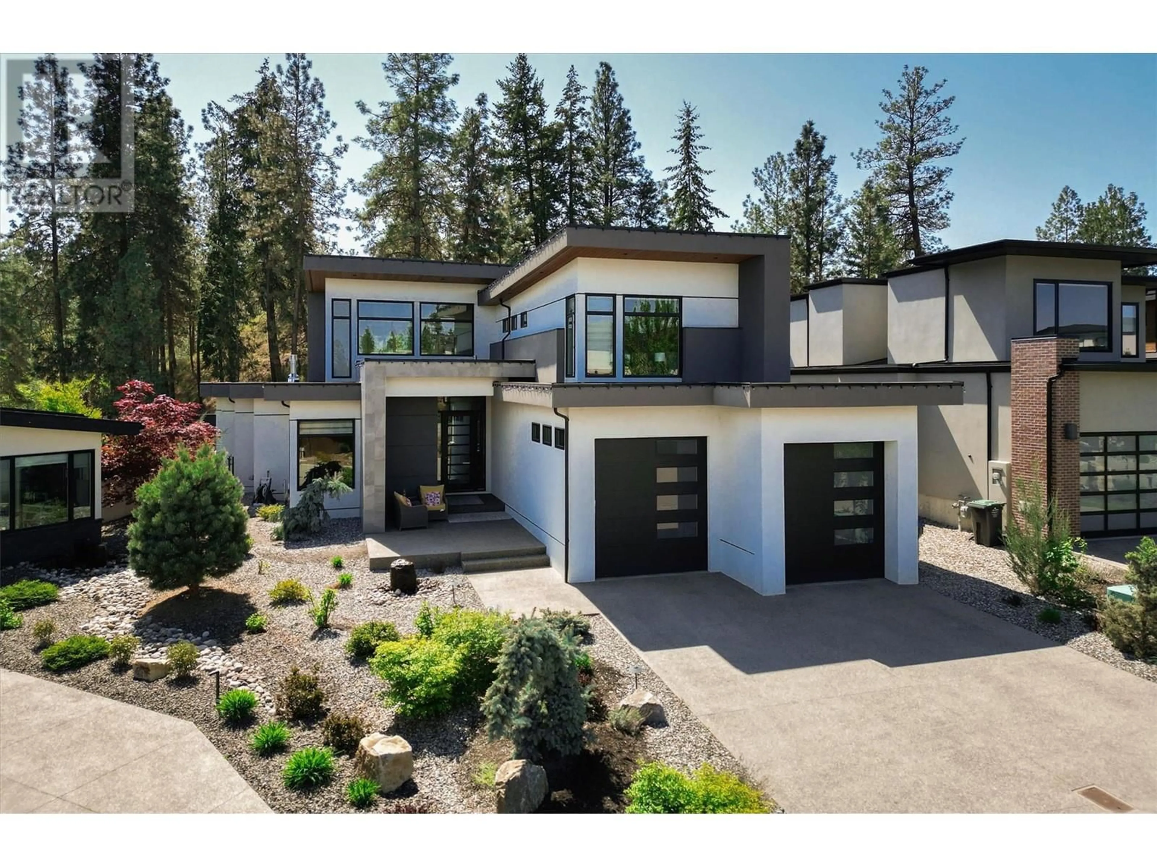 Home with vinyl exterior material, street for 3 - 1150 MISSION RIDGE ROAD, Kelowna British Columbia V1W3B2
