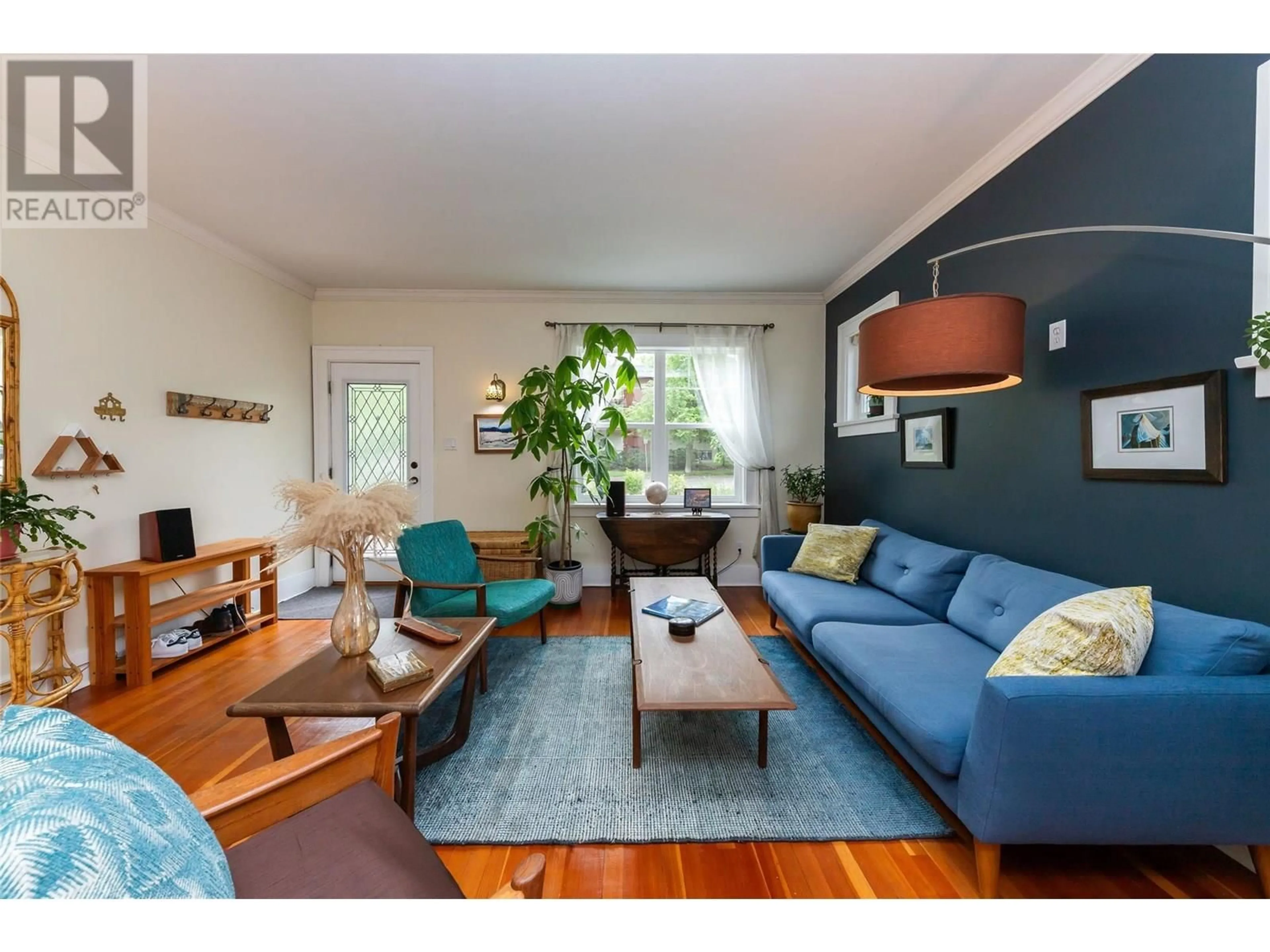 Living room with furniture, wood/laminate floor for 786 ST PAUL STREET, Kamloops British Columbia V2C2K4