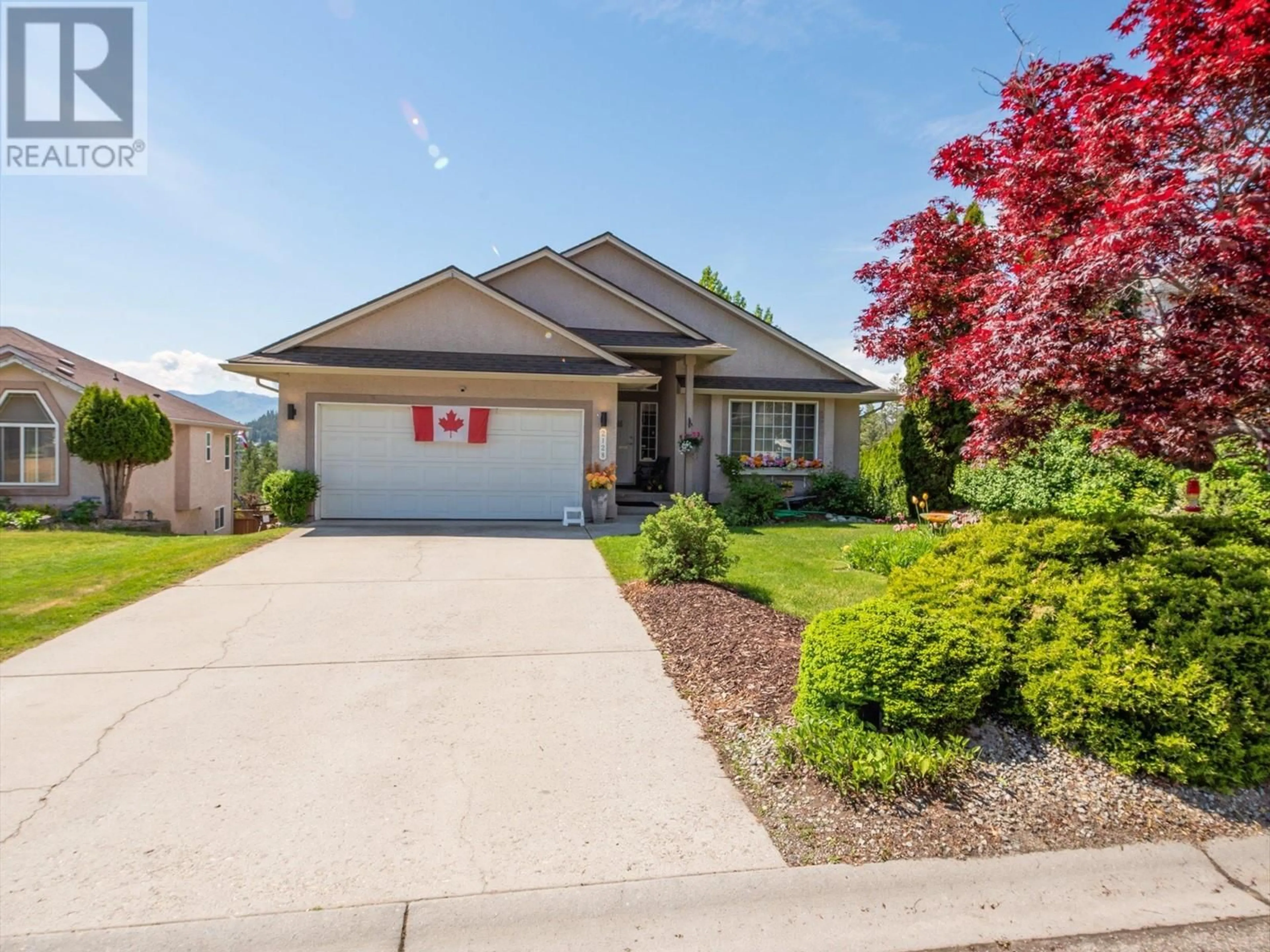 Home with vinyl exterior material, street for 2128 SUNVIEW DRIVE, West Kelowna British Columbia V1Z3R1