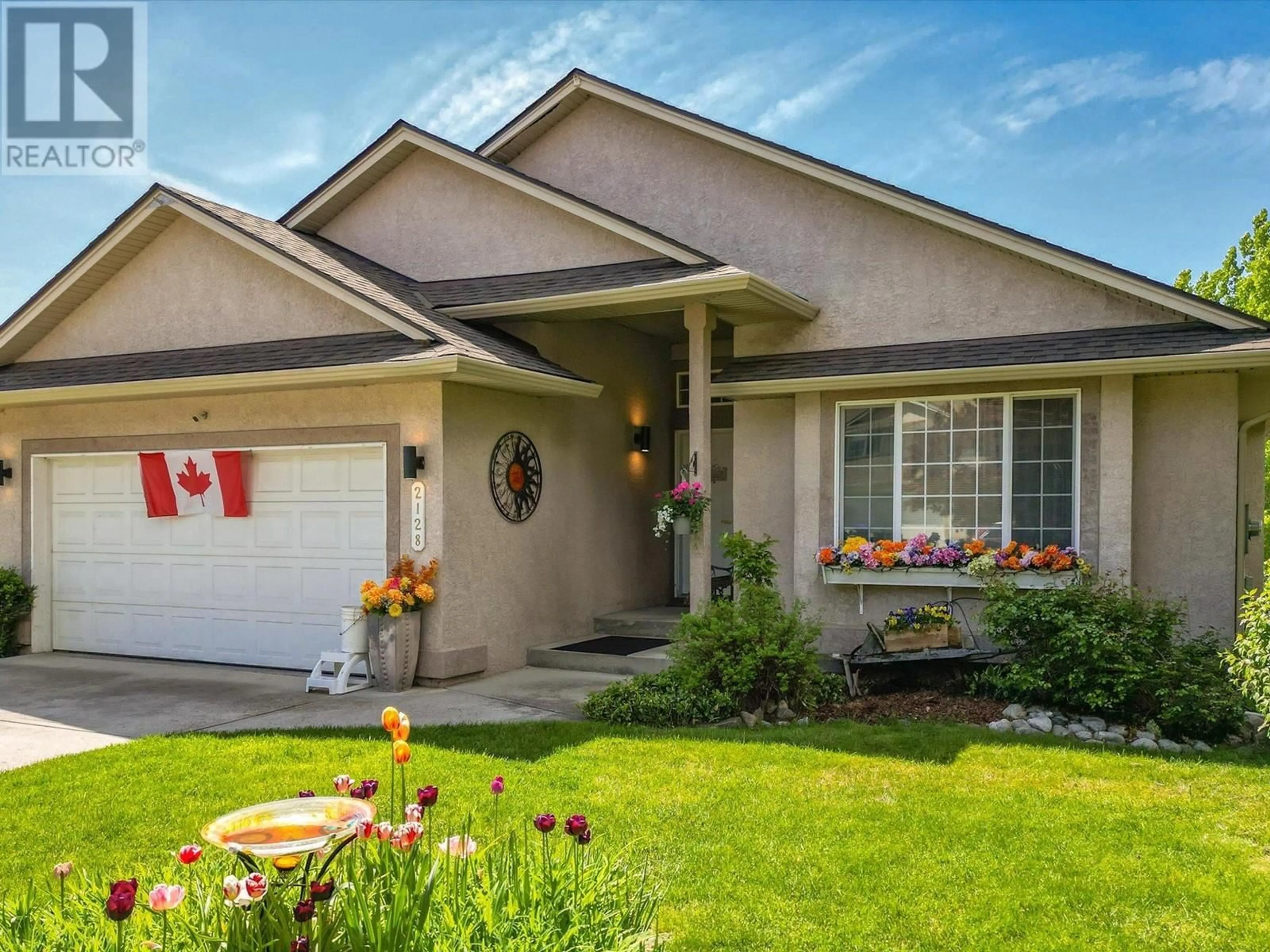 Home with vinyl exterior material, street for 2128 SUNVIEW DRIVE, West Kelowna British Columbia V1Z3R1