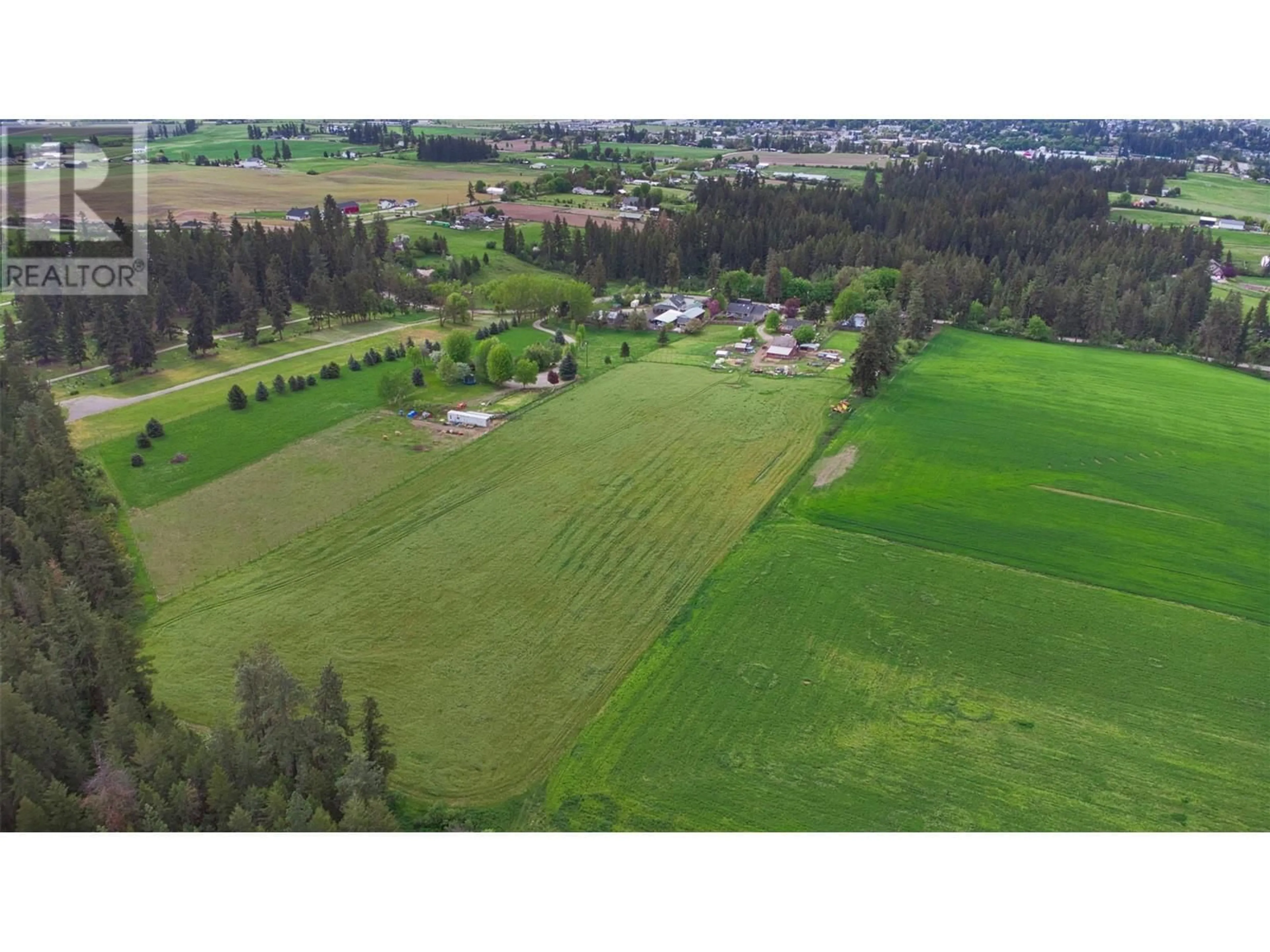 A pic from outside/outdoor area/front of a property/back of a property/a pic from drone, mountain view for 4356 HIGHLAND PARK ROAD, Armstrong British Columbia V0E1B4