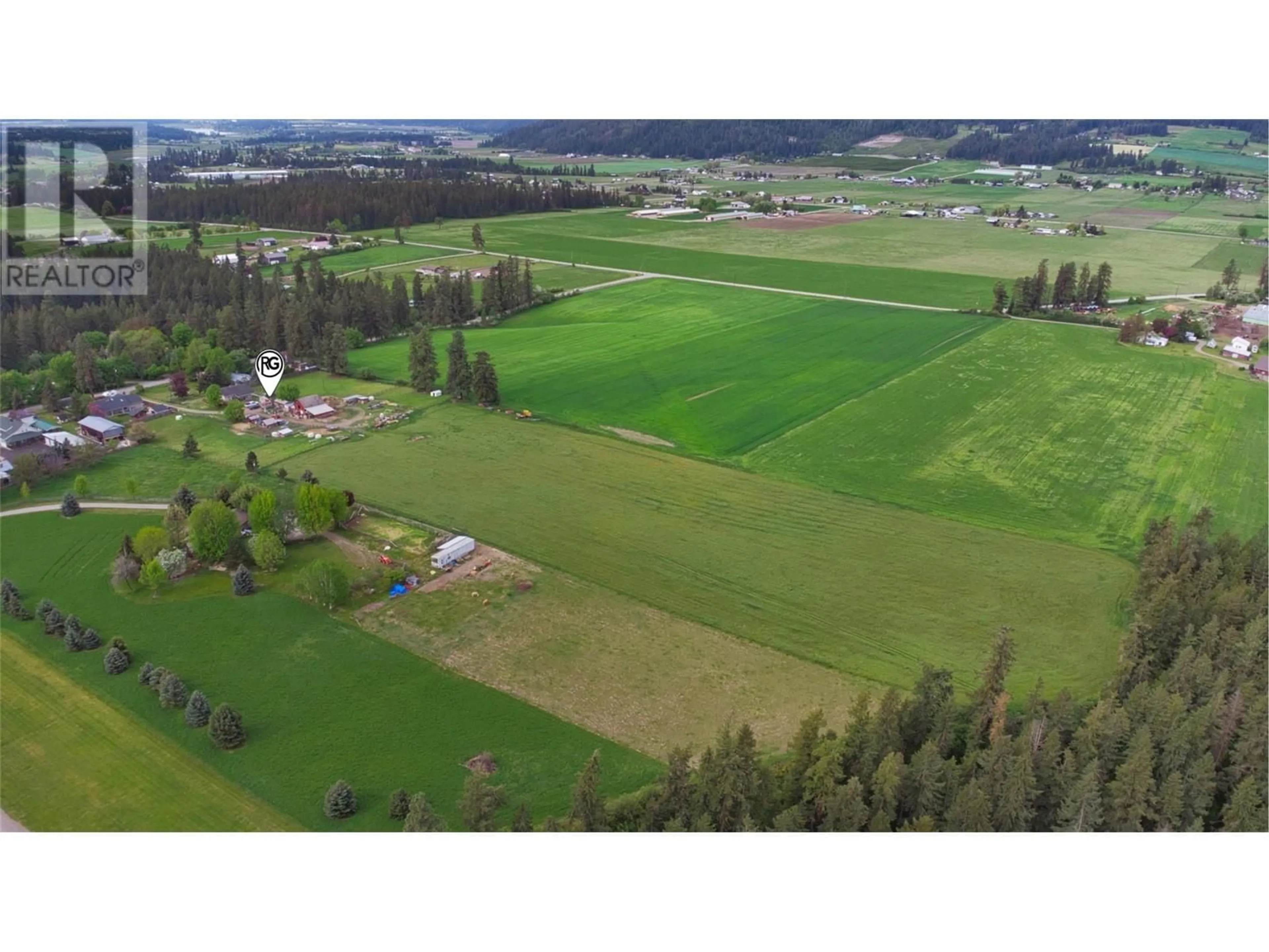 A pic from outside/outdoor area/front of a property/back of a property/a pic from drone, mountain view for 4356 HIGHLAND PARK ROAD, Armstrong British Columbia V0E1B4