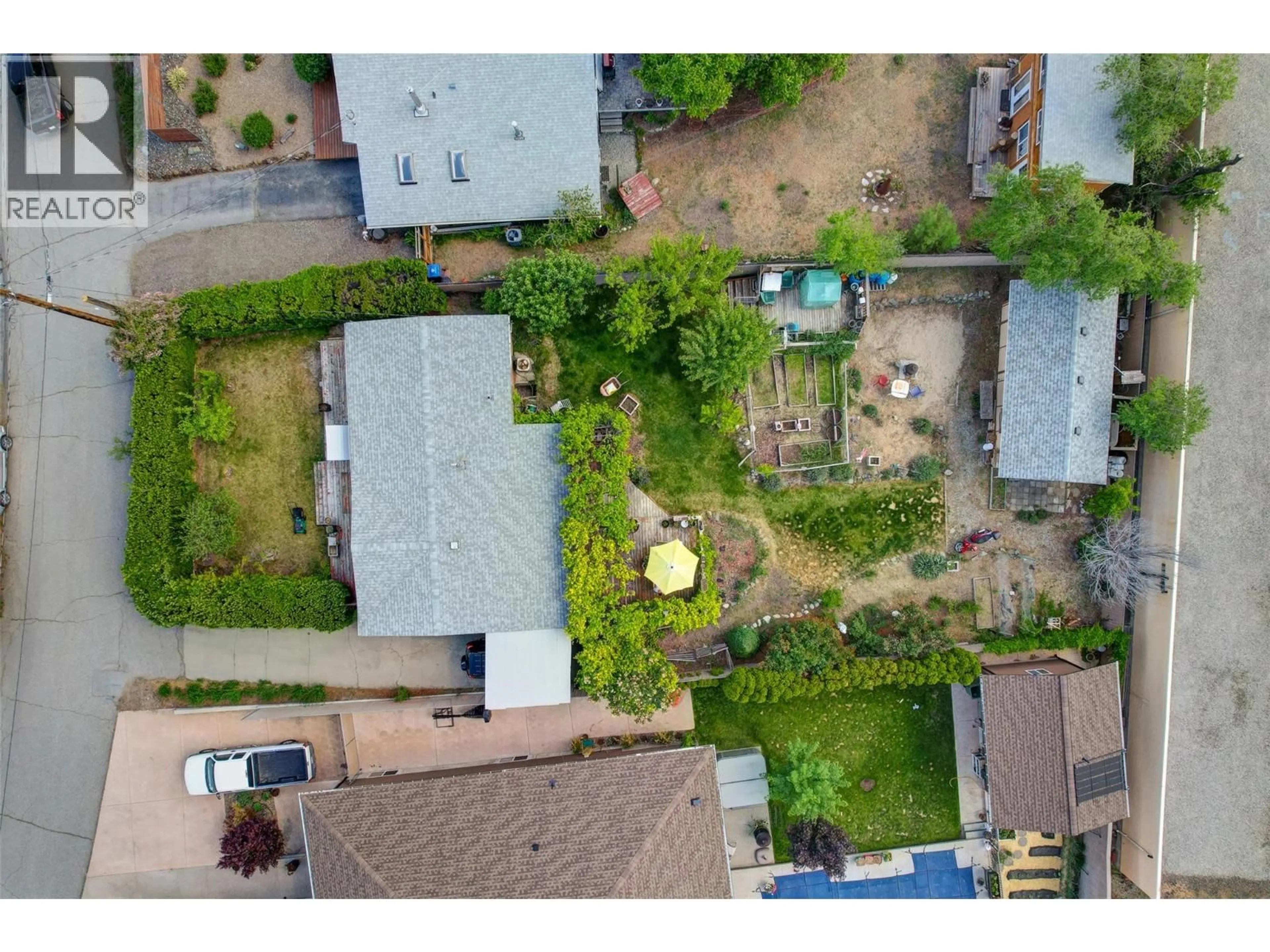 A pic from outside/outdoor area/front of a property/back of a property/a pic from drone, street for 8 ROSE PLACE, Osoyoos British Columbia V0H1V1