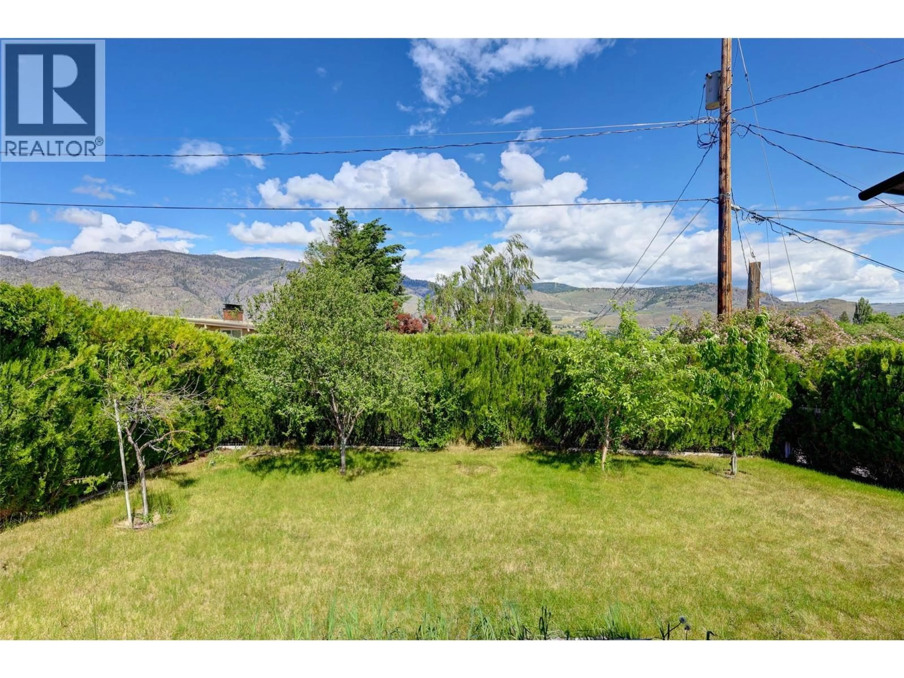 A pic from outside/outdoor area/front of a property/back of a property/a pic from drone, mountain view for 8 ROSE PLACE, Osoyoos British Columbia V0H1V1