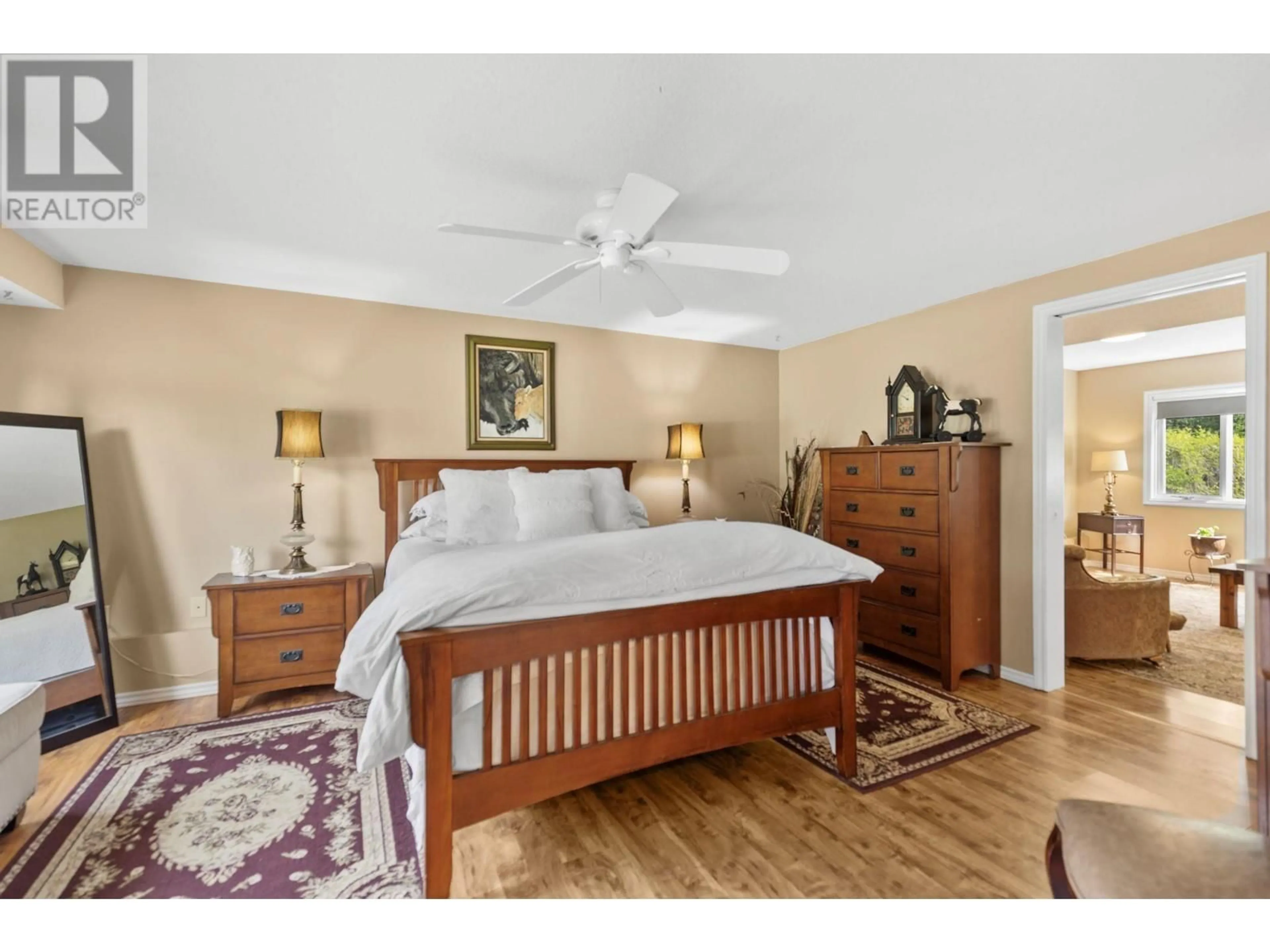 Bedroom with bed, wood/laminate floor for 4728 BIRCH LANE NORTHEAST, Barriere British Columbia V0E1E0