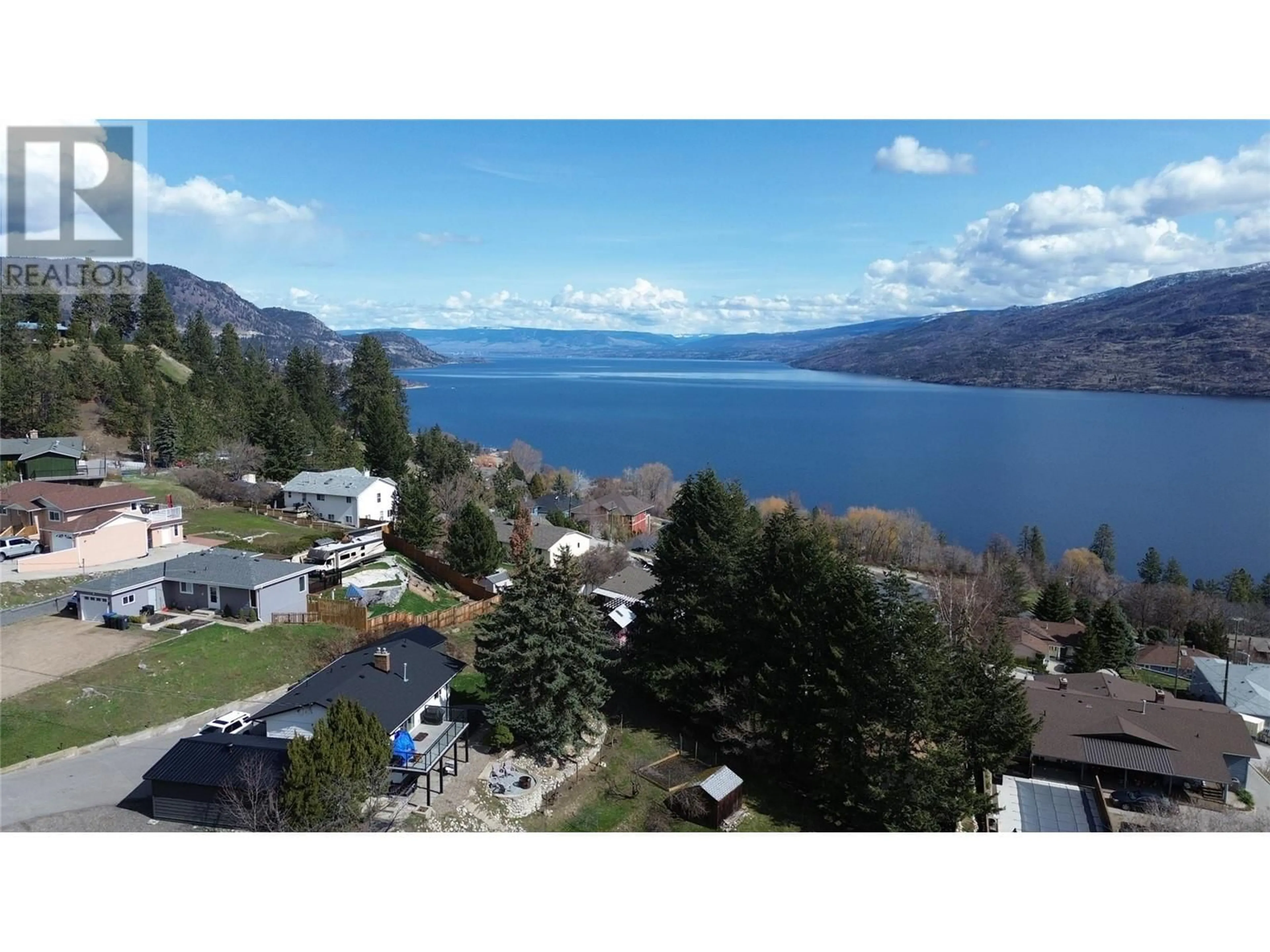 A pic from outside/outdoor area/front of a property/back of a property/a pic from drone, water/lake/river/ocean view for 6040 ELLISON AVENUE, Peachland British Columbia V0H1X4