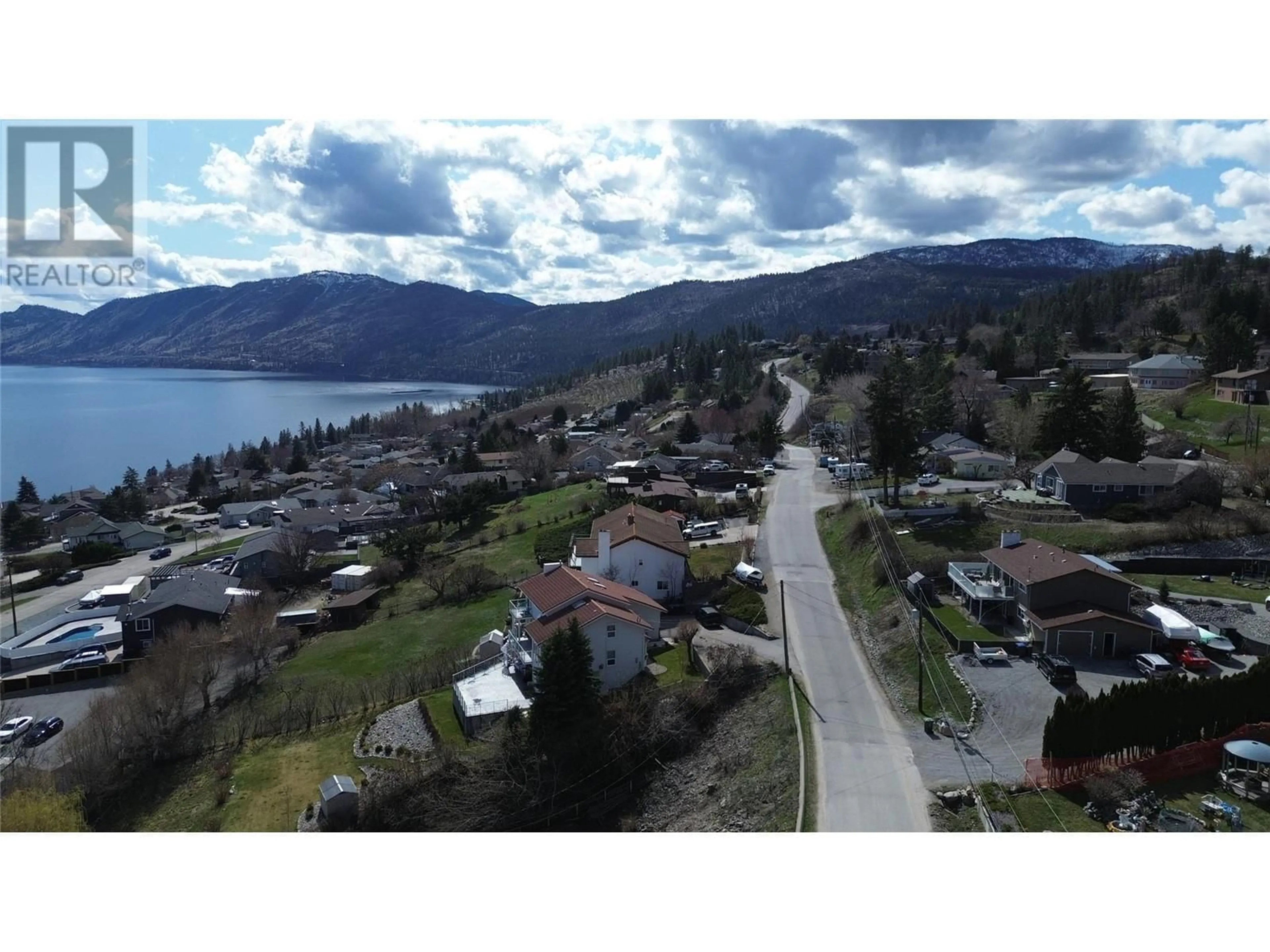 A pic from outside/outdoor area/front of a property/back of a property/a pic from drone, water/lake/river/ocean view for 6040 ELLISON AVENUE, Peachland British Columbia V0H1X4