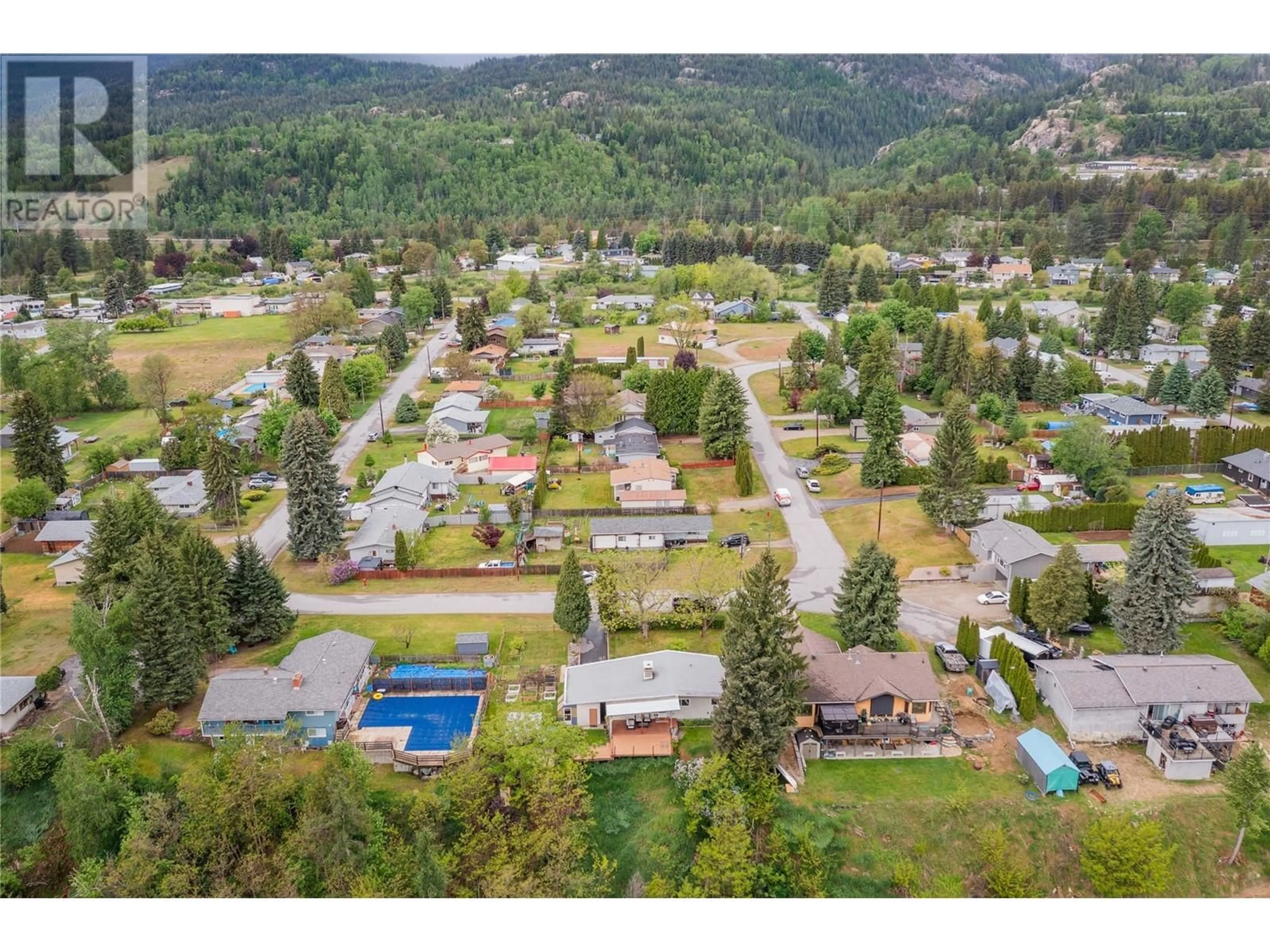 A pic from outside/outdoor area/front of a property/back of a property/a pic from drone, mountain view for 435 104TH STREET, Castlegar British Columbia V1N3G6