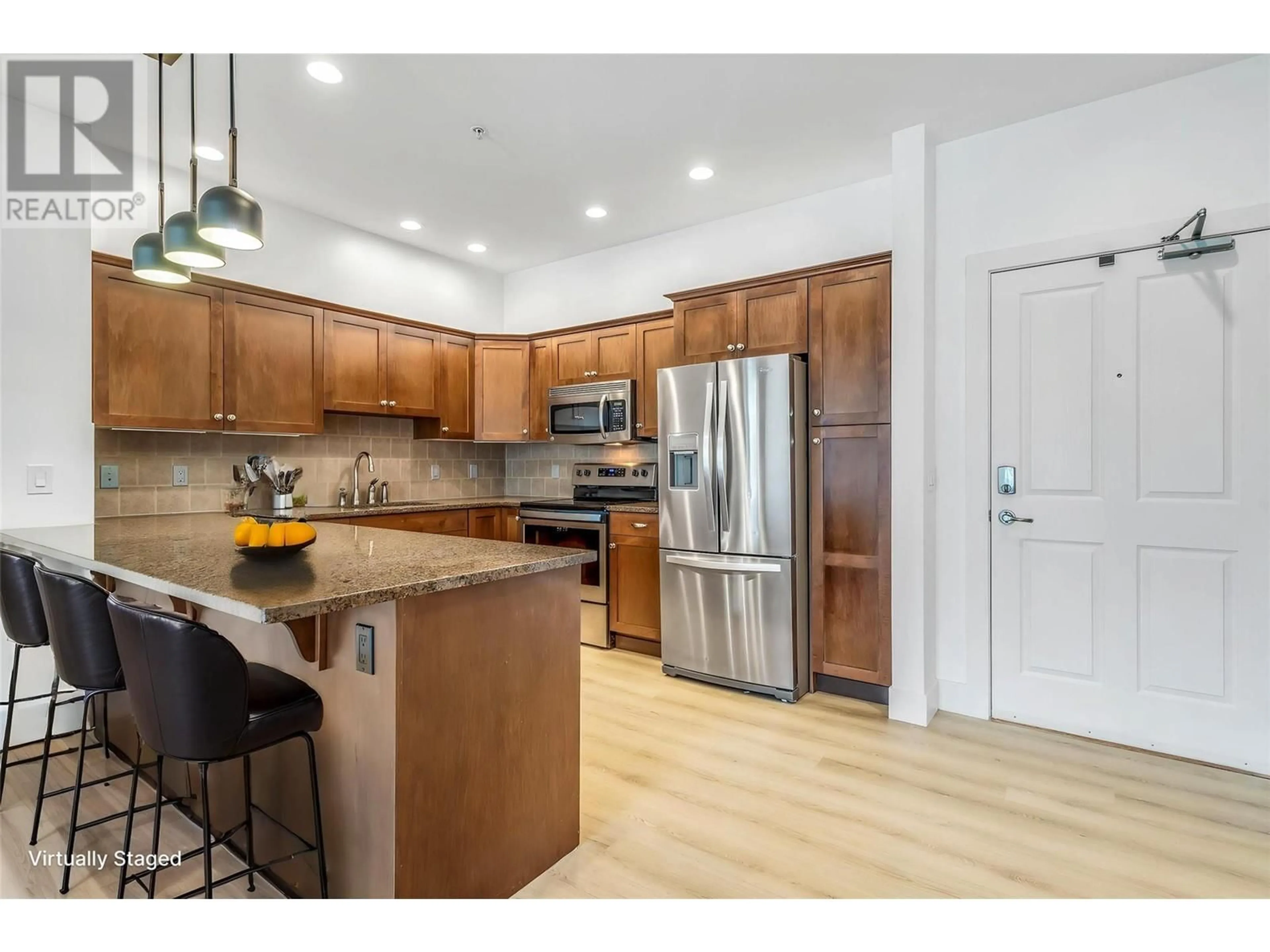 Open concept kitchen, wood/laminate floor for 3306 - 3832 OLD OKANAGAN HIGHWAY, West Kelowna British Columbia V4T3G6