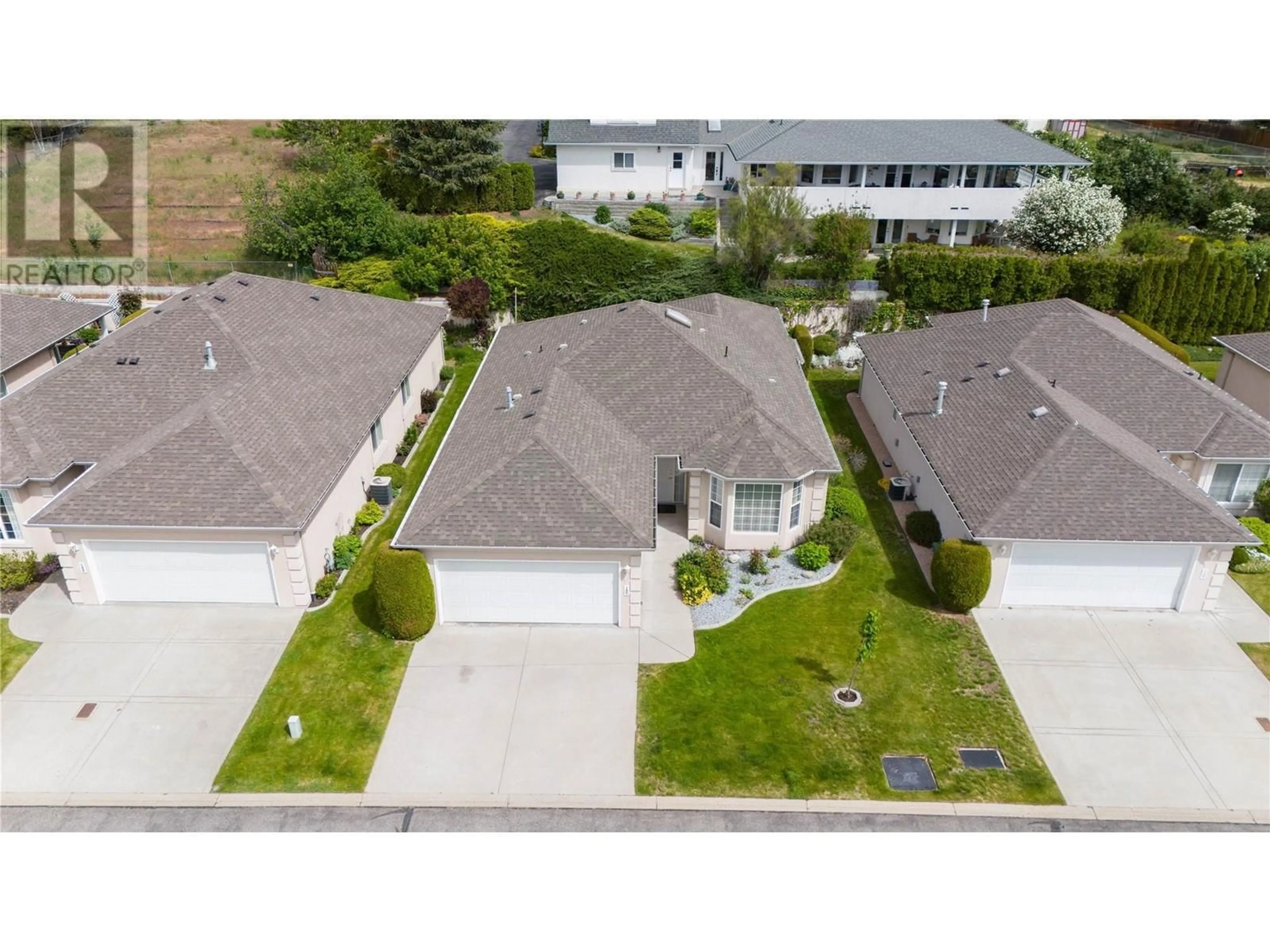 A pic from outside/outdoor area/front of a property/back of a property/a pic from drone, street for 140 - 3360 OLD OKANAGAN HIGHWAY, West Kelowna British Columbia V4T1X9