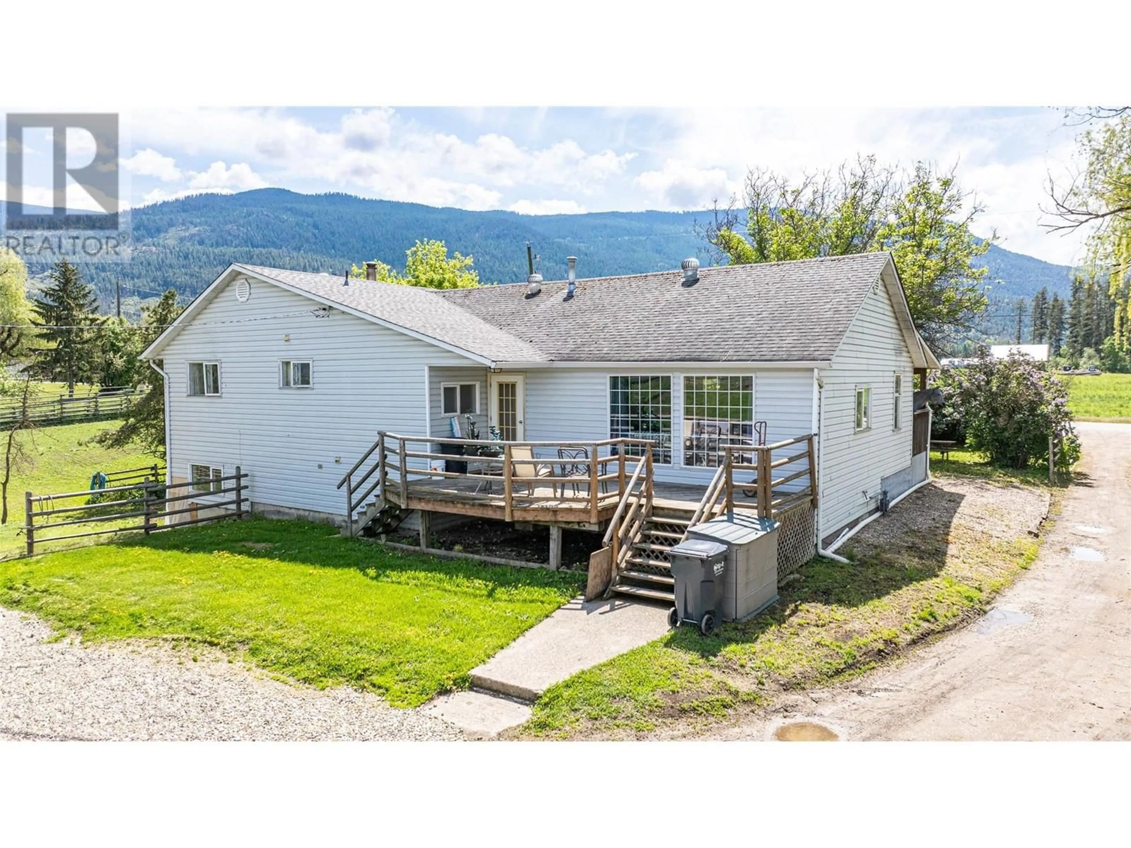 A pic from outside/outdoor area/front of a property/back of a property/a pic from drone, mountain view for 1956 ROSEDALE E AVENUE, Armstrong British Columbia V4Y0P1