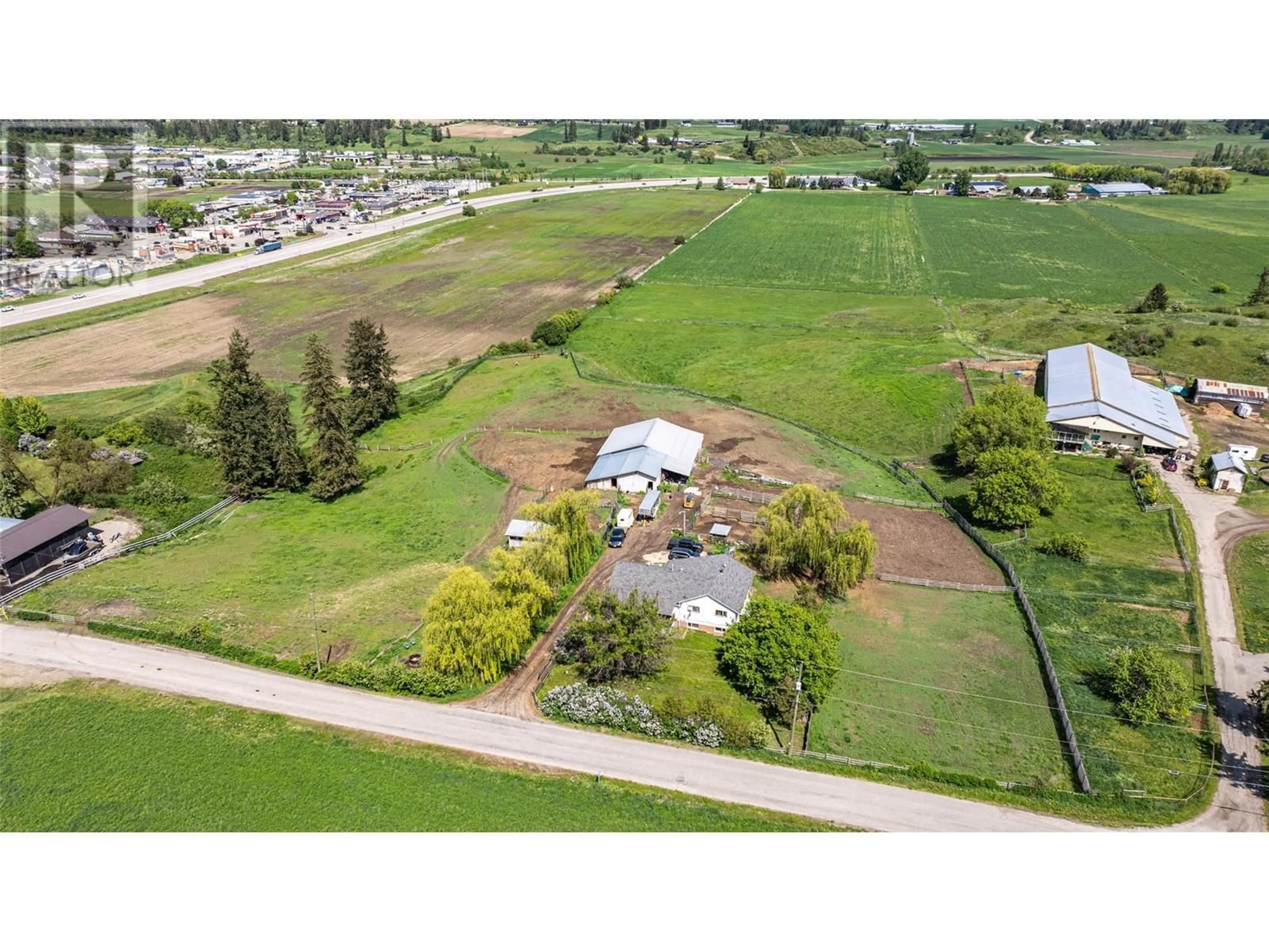 A pic from outside/outdoor area/front of a property/back of a property/a pic from drone, mountain view for 1956 ROSEDALE E AVENUE, Armstrong British Columbia V4Y0P1