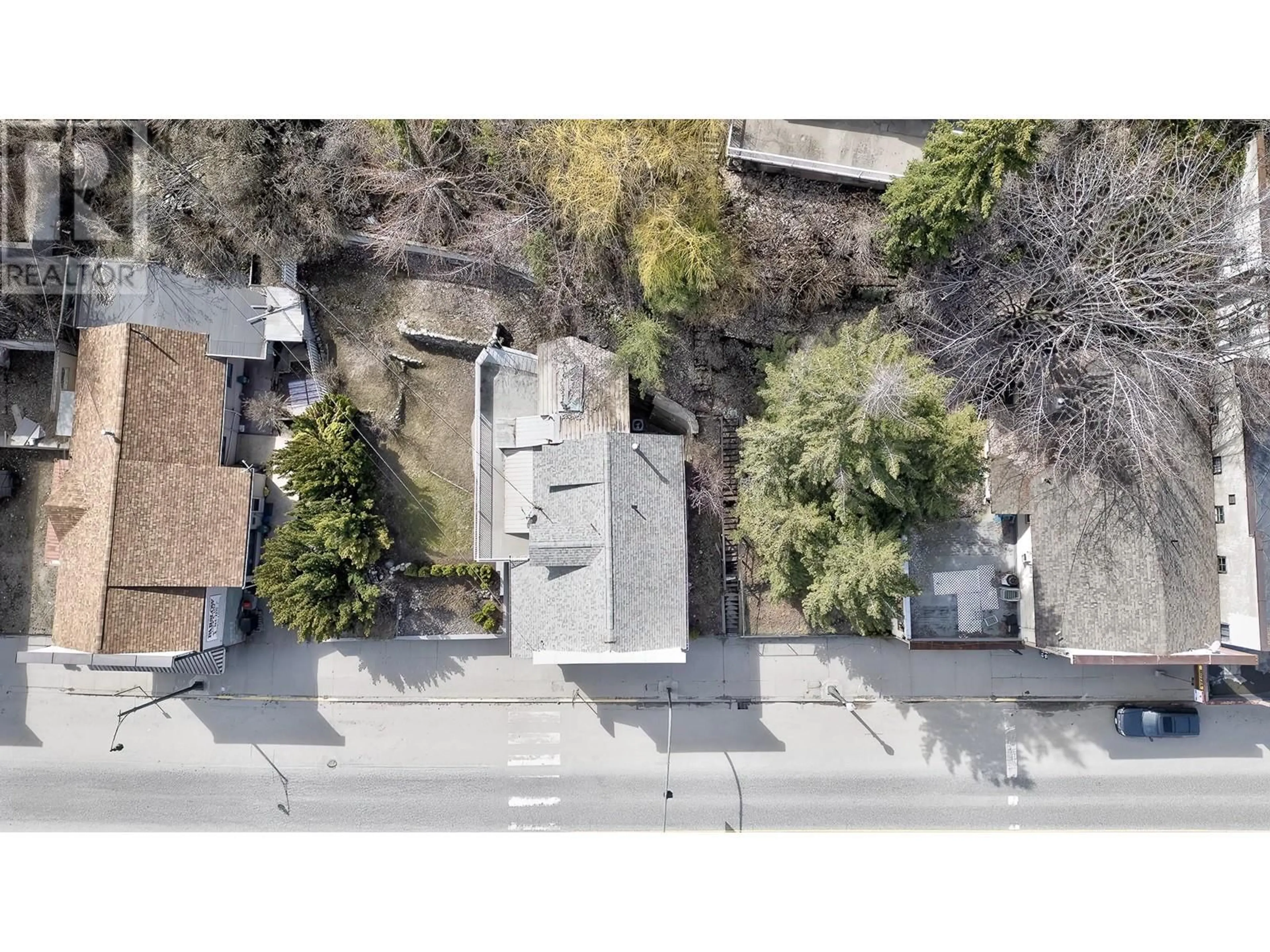 A pic from outside/outdoor area/front of a property/back of a property/a pic from drone, street for 792 ROSSLAND AVENUE, Trail British Columbia V1R3N3