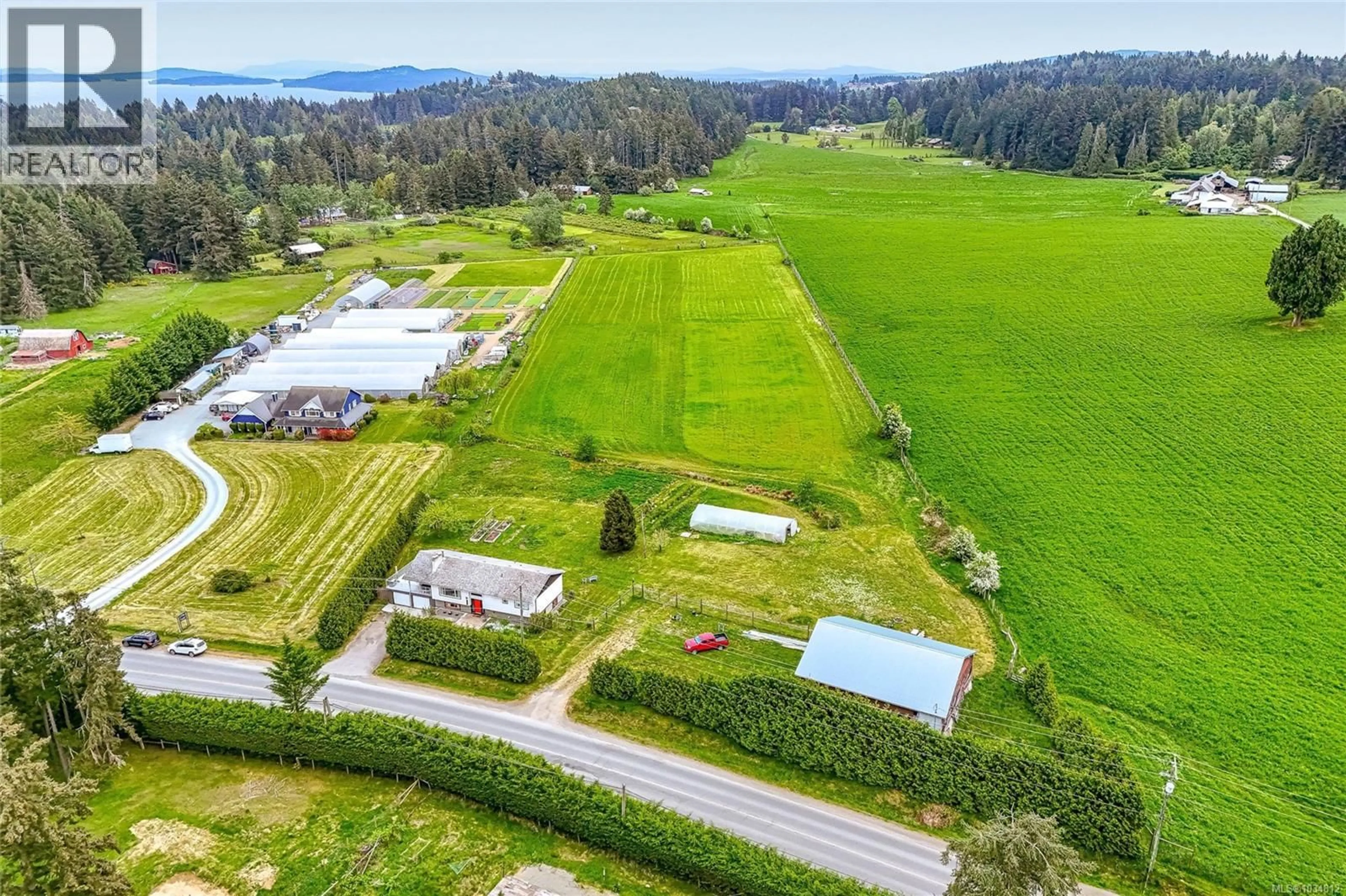 A pic from outside/outdoor area/front of a property/back of a property/a pic from drone, mountain view for 1160 FISHER ROAD, Cobble Hill British Columbia V8H0G2
