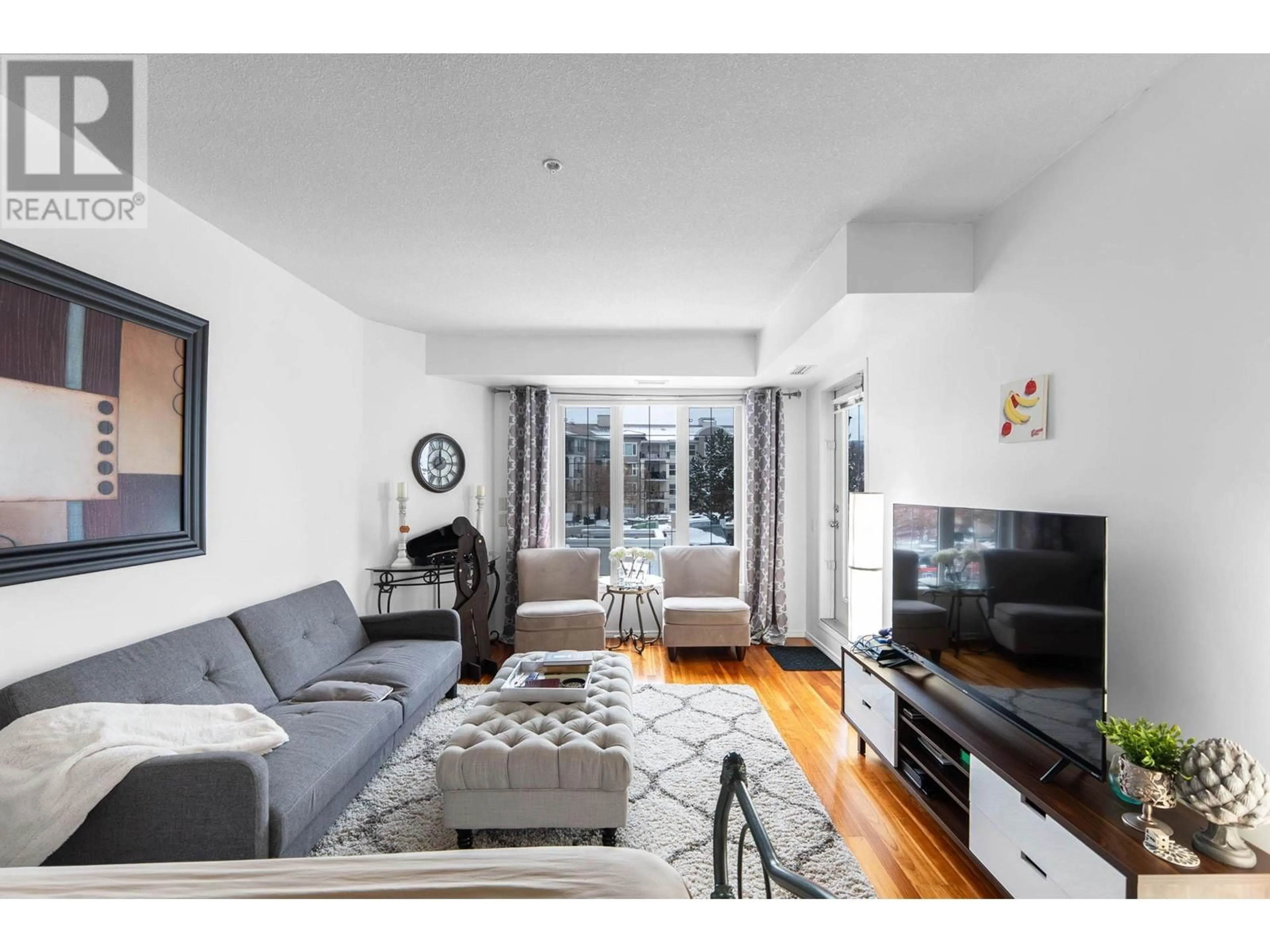 Living room with furniture, unknown for 1202 - 3168 VIA CENTRALE ROAD, Kelowna British Columbia V1V2R6