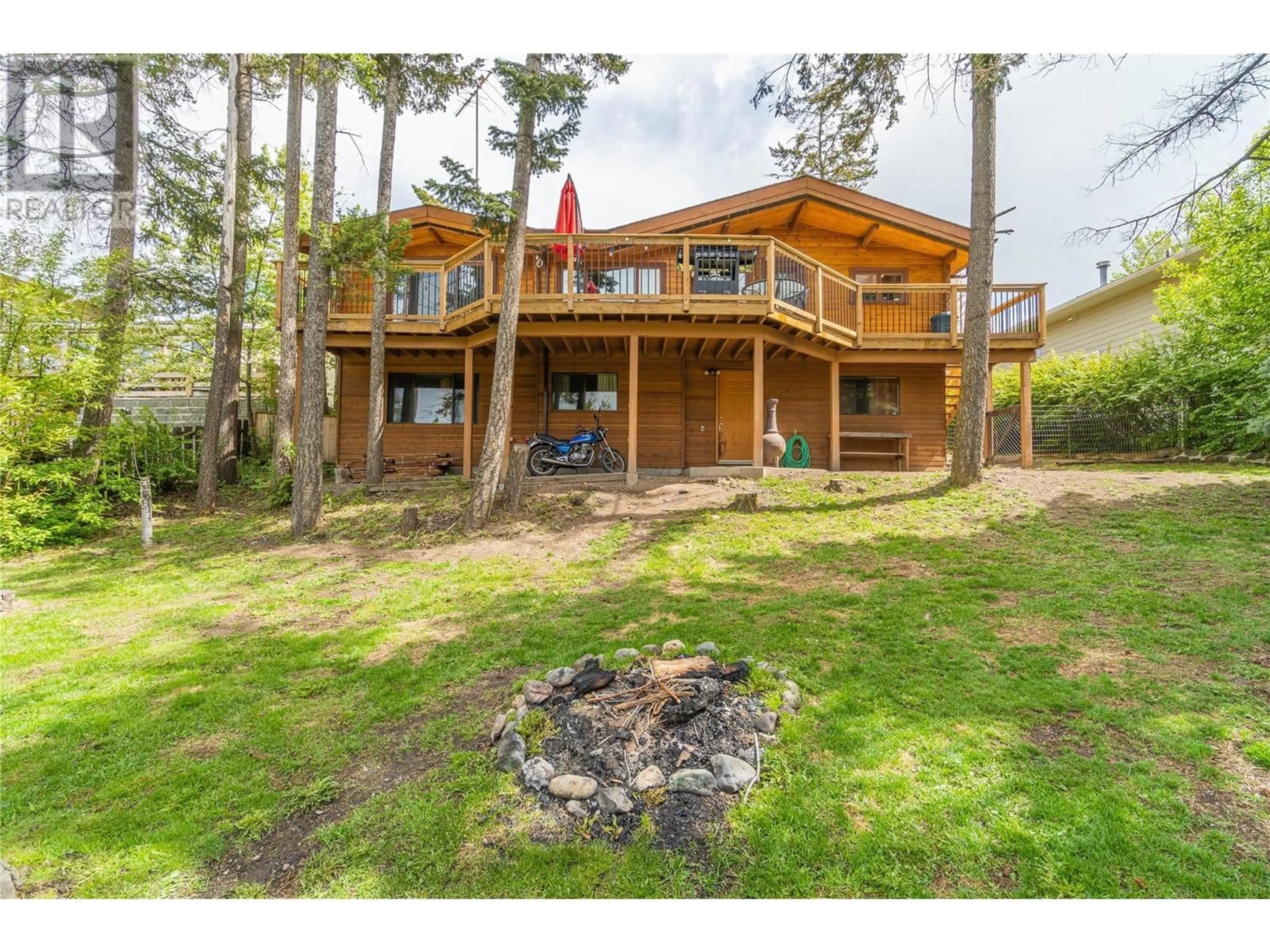 A pic from outside/outdoor area/front of a property/back of a property/a pic from drone, water/lake/river/ocean view for 33 BRECCIA DRIVE, Logan Lake British Columbia V0K1W0