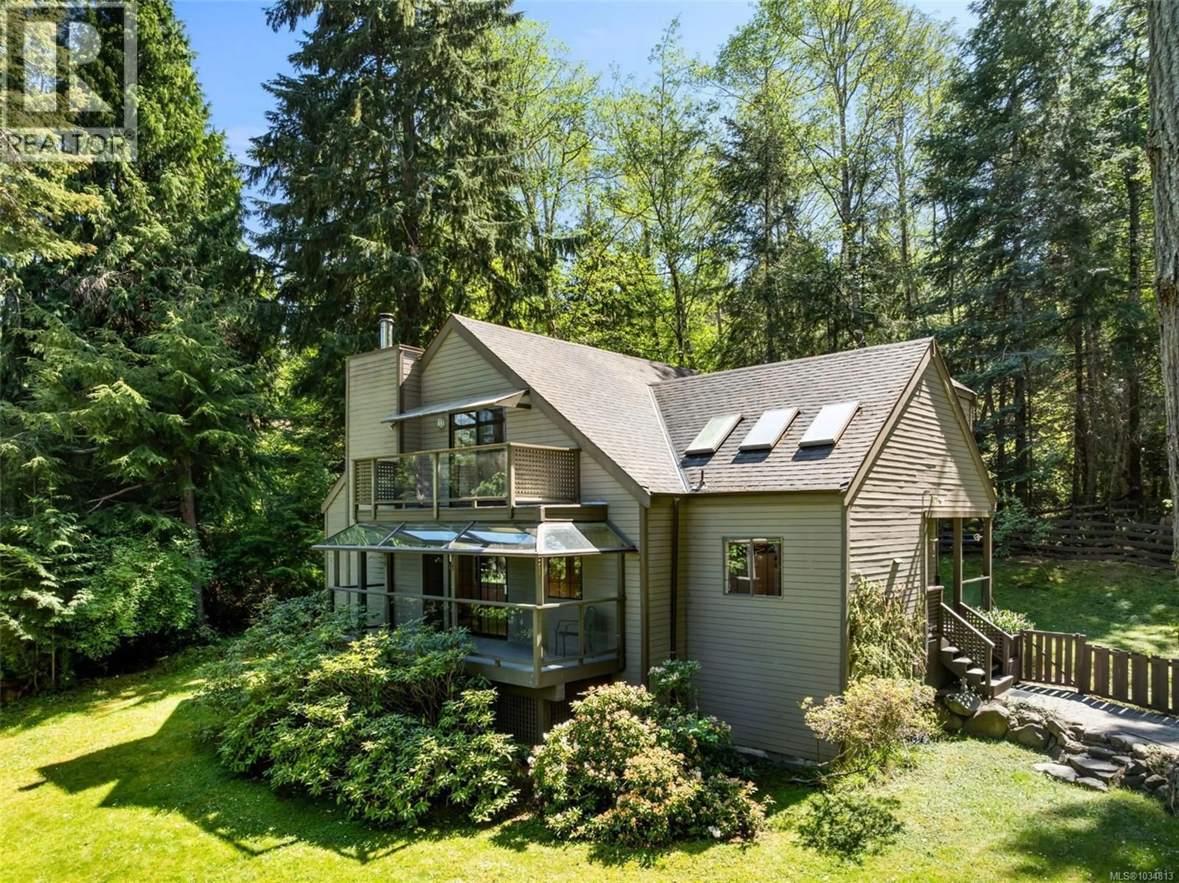 A pic from outside/outdoor area/front of a property/back of a property/a pic from drone, forest/trees view for 6089 BRECON DRIVE, Sooke British Columbia V9Z1B1
