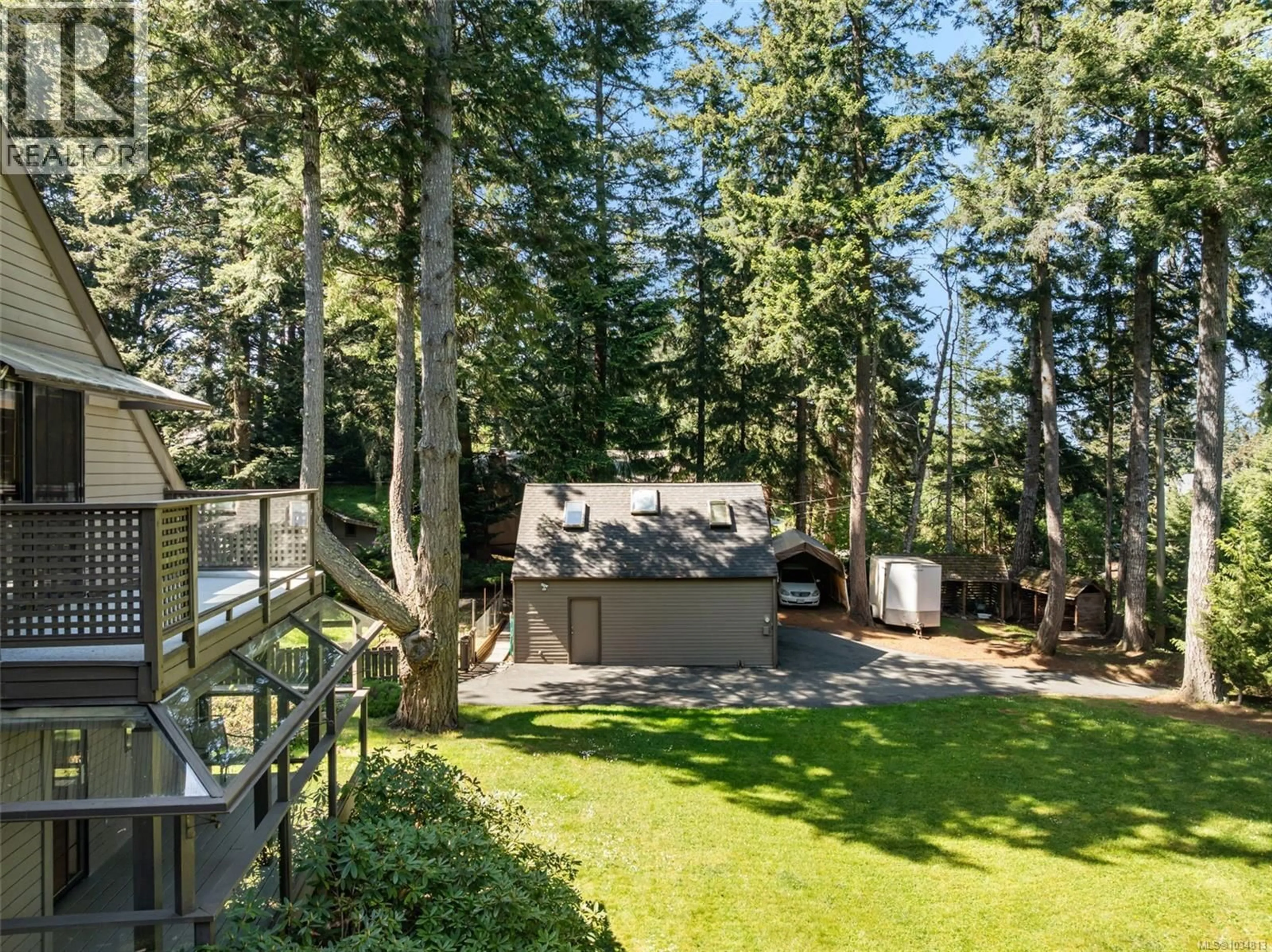 A pic from outside/outdoor area/front of a property/back of a property/a pic from drone, forest/trees view for 6089 BRECON DRIVE, Sooke British Columbia V9Z1B1