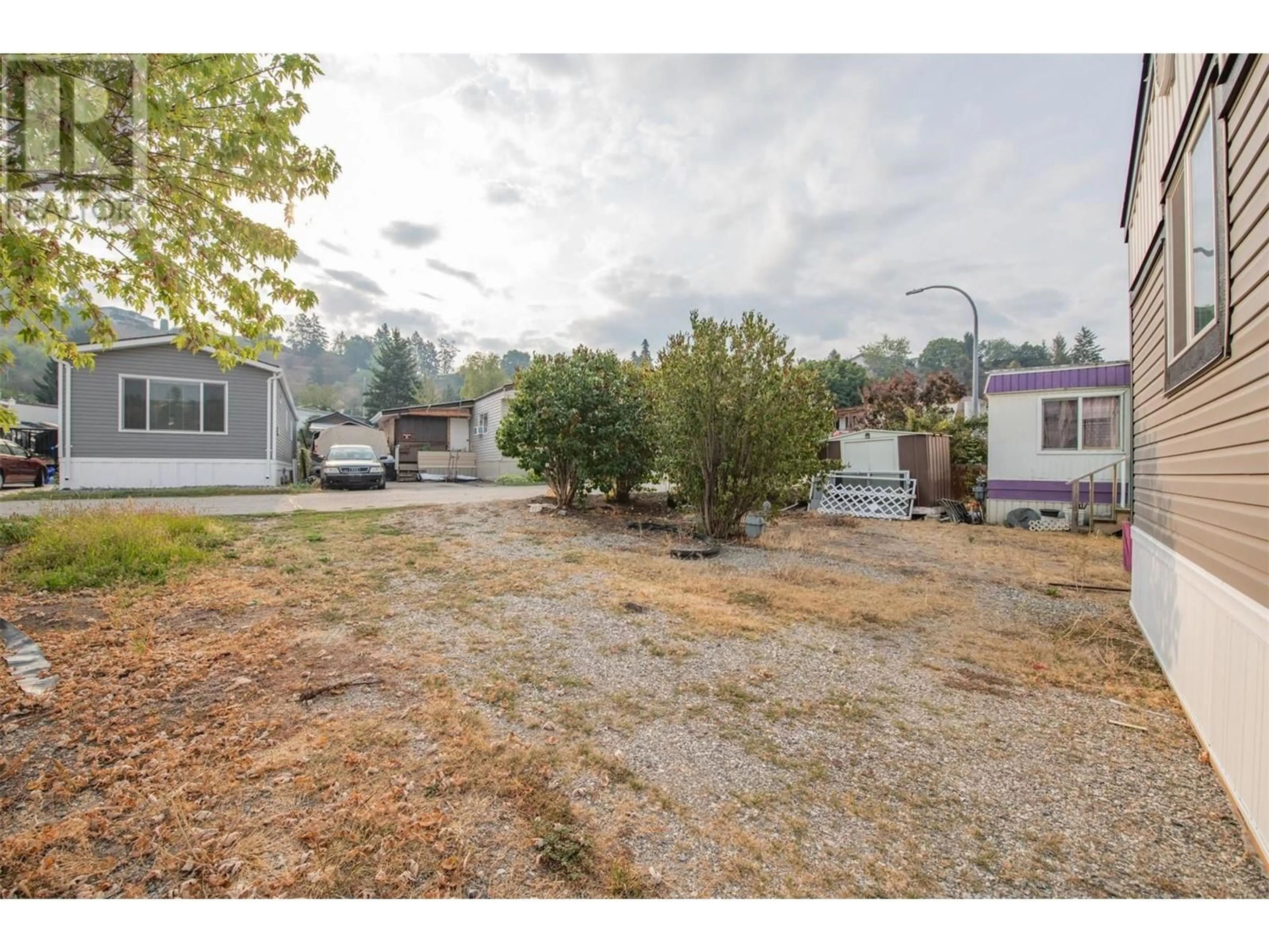 A pic from outside/outdoor area/front of a property/back of a property/a pic from drone, unknown for 151 - 15401 KALAMALKA ROAD, Vernon British Columbia V1B2B3