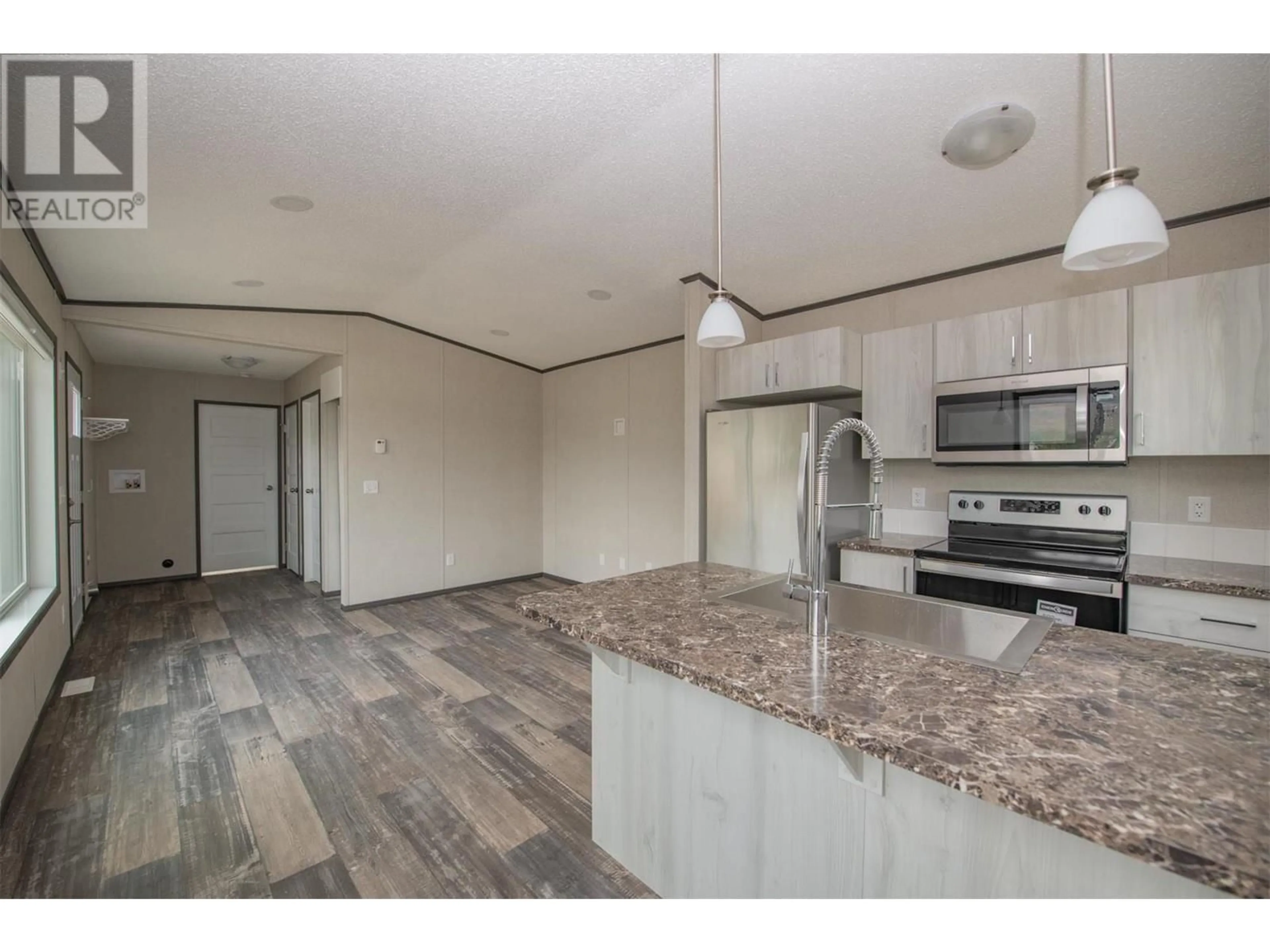 Open concept kitchen, unknown for 151 - 15401 KALAMALKA ROAD, Vernon British Columbia V1B2B3