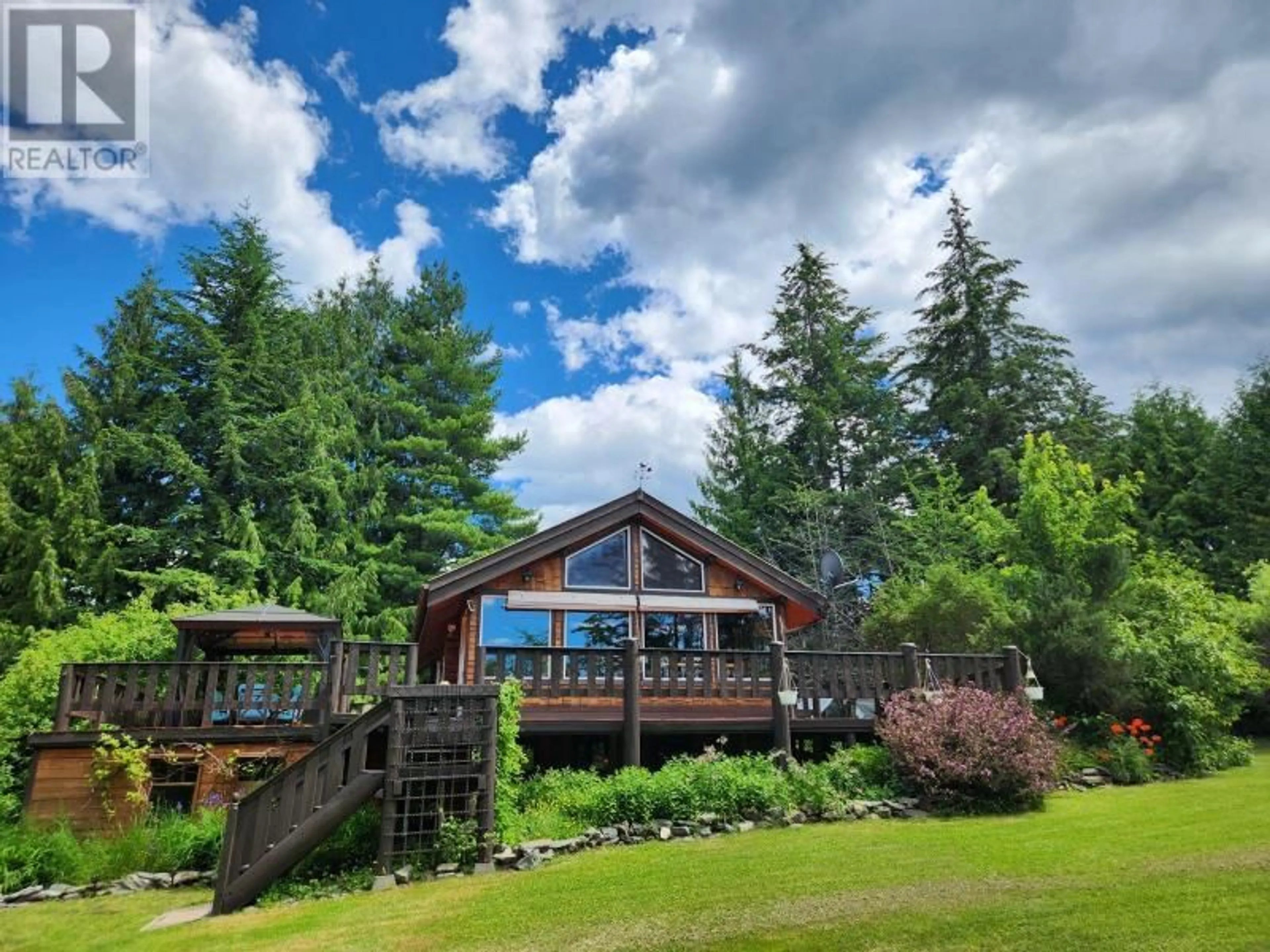 A pic from outside/outdoor area/front of a property/back of a property/a pic from drone, water/lake/river/ocean view for 4061 TORRY ROAD, Eagle Bay British Columbia V0E1T0