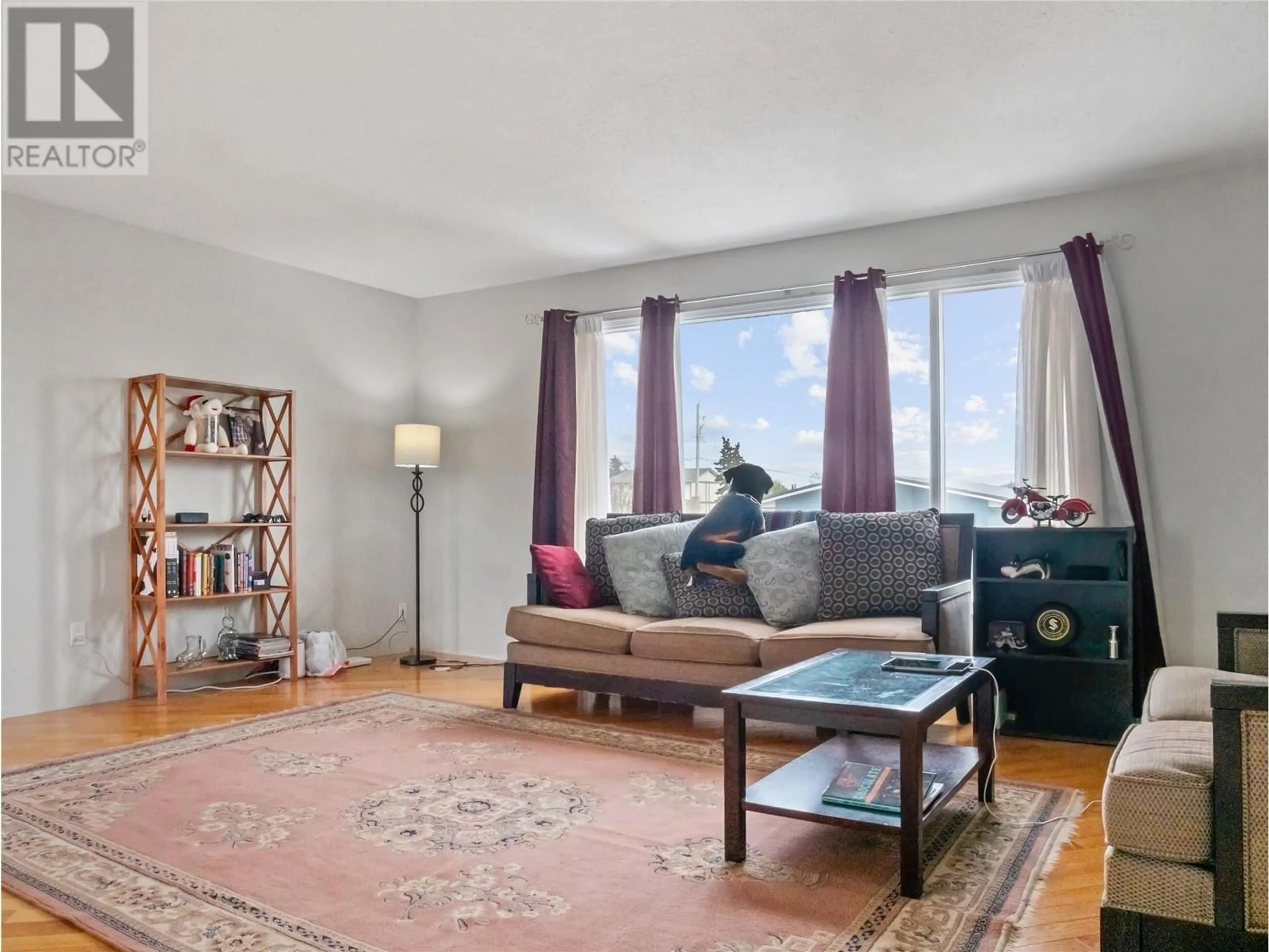 Living room with furniture, unknown for 704 96A AVENUE, Dawson Creek British Columbia V1G1M7