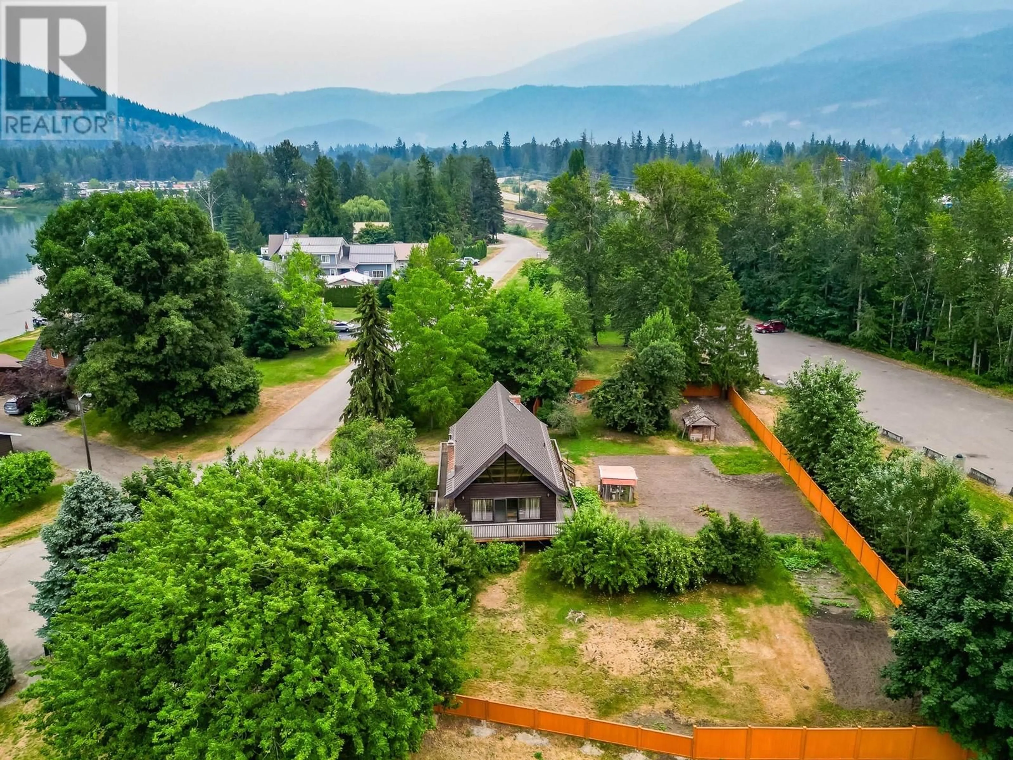 A pic from outside/outdoor area/front of a property/back of a property/a pic from drone, mountain view for 1416 SILVER SANDS ROAD, Sicamous British Columbia V0E2V4