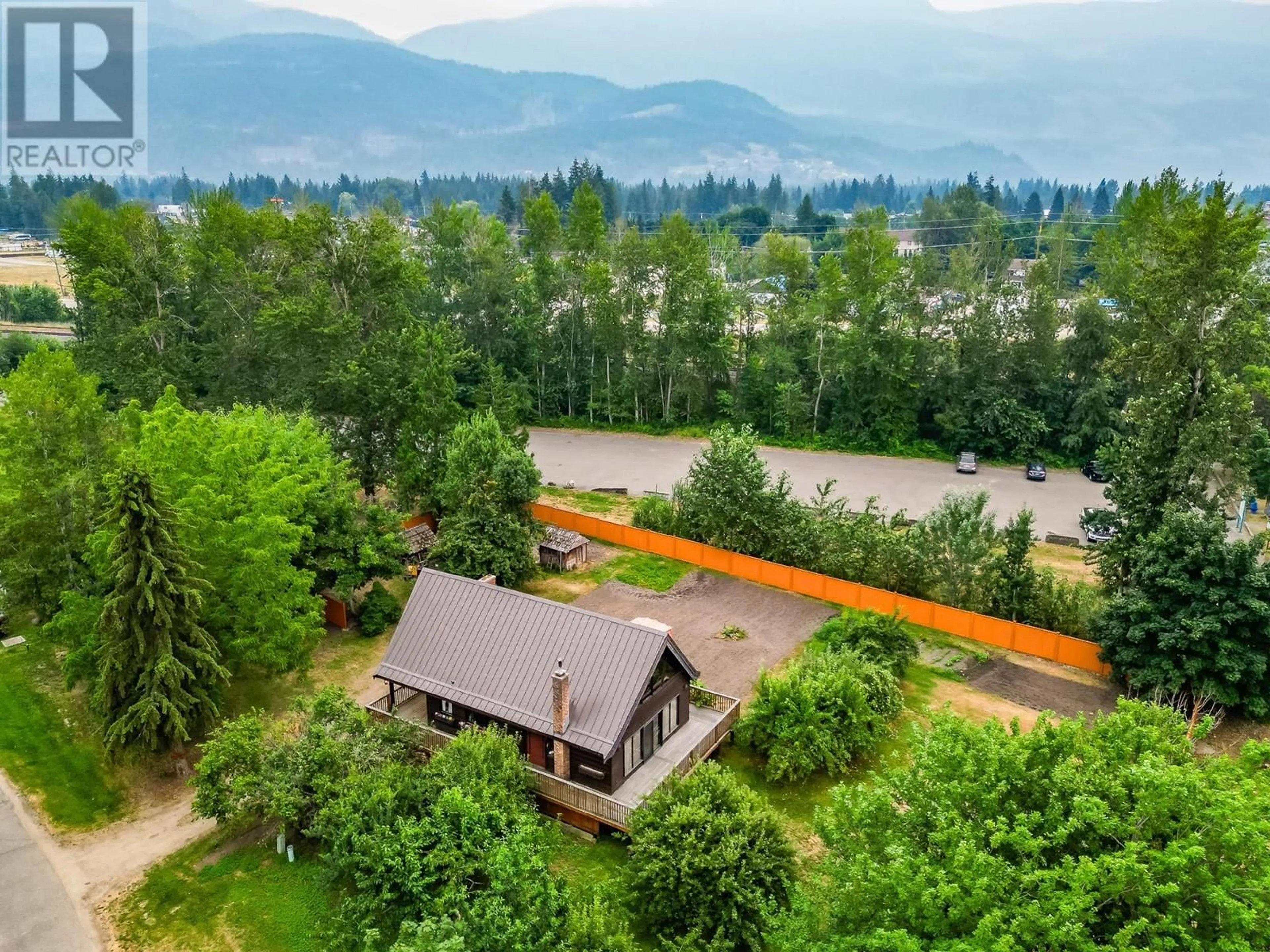 A pic from outside/outdoor area/front of a property/back of a property/a pic from drone, water/lake/river/ocean view for 1416 SILVER SANDS ROAD, Sicamous British Columbia V0E2V4