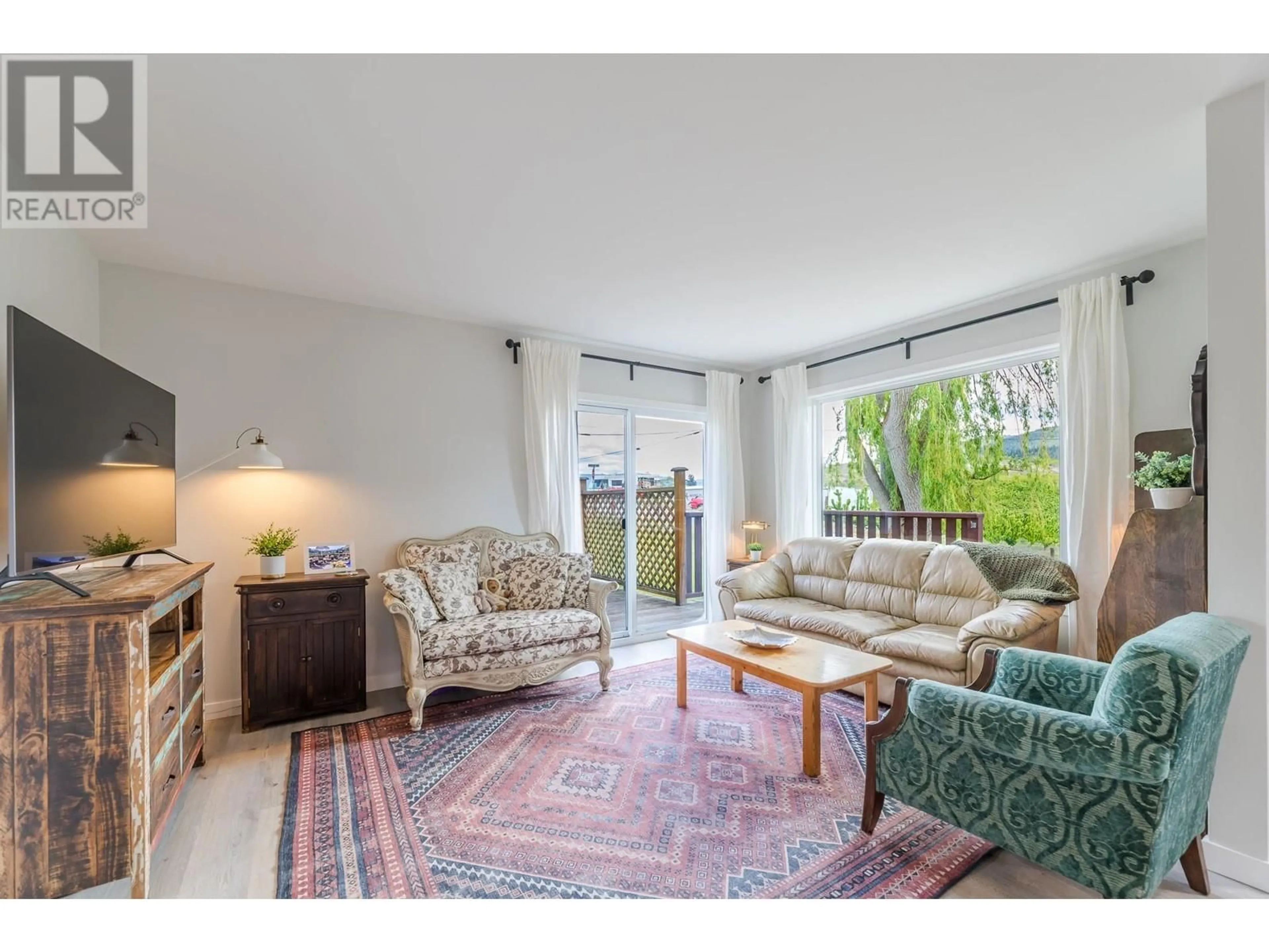 Living room with furniture, unknown for 7515 HILLBORN STREET, Summerland British Columbia V0H1Z7