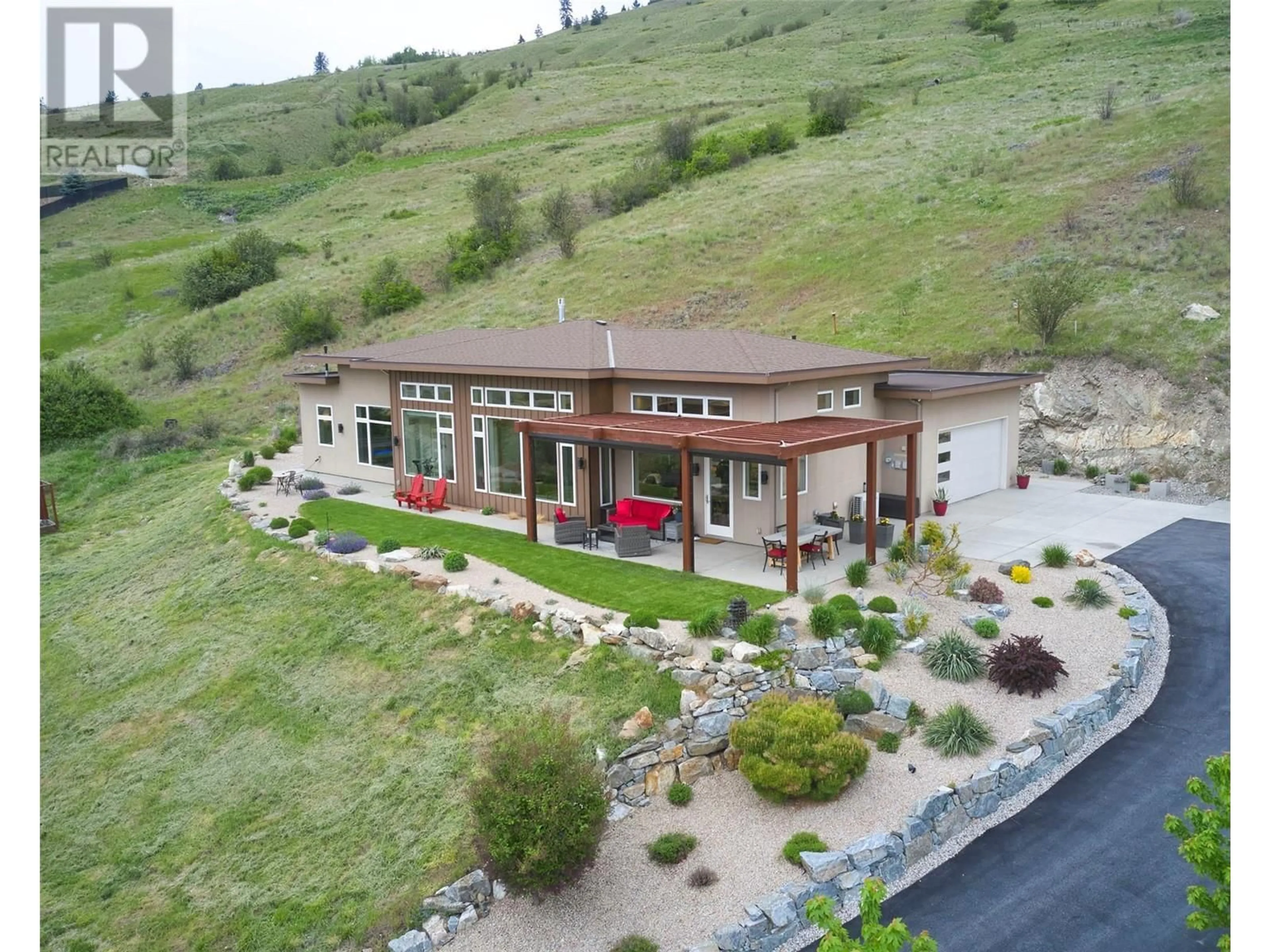 A pic from outside/outdoor area/front of a property/back of a property/a pic from drone, unknown for 56 RAVINE DRIVE, Coldstream British Columbia V1B4C9