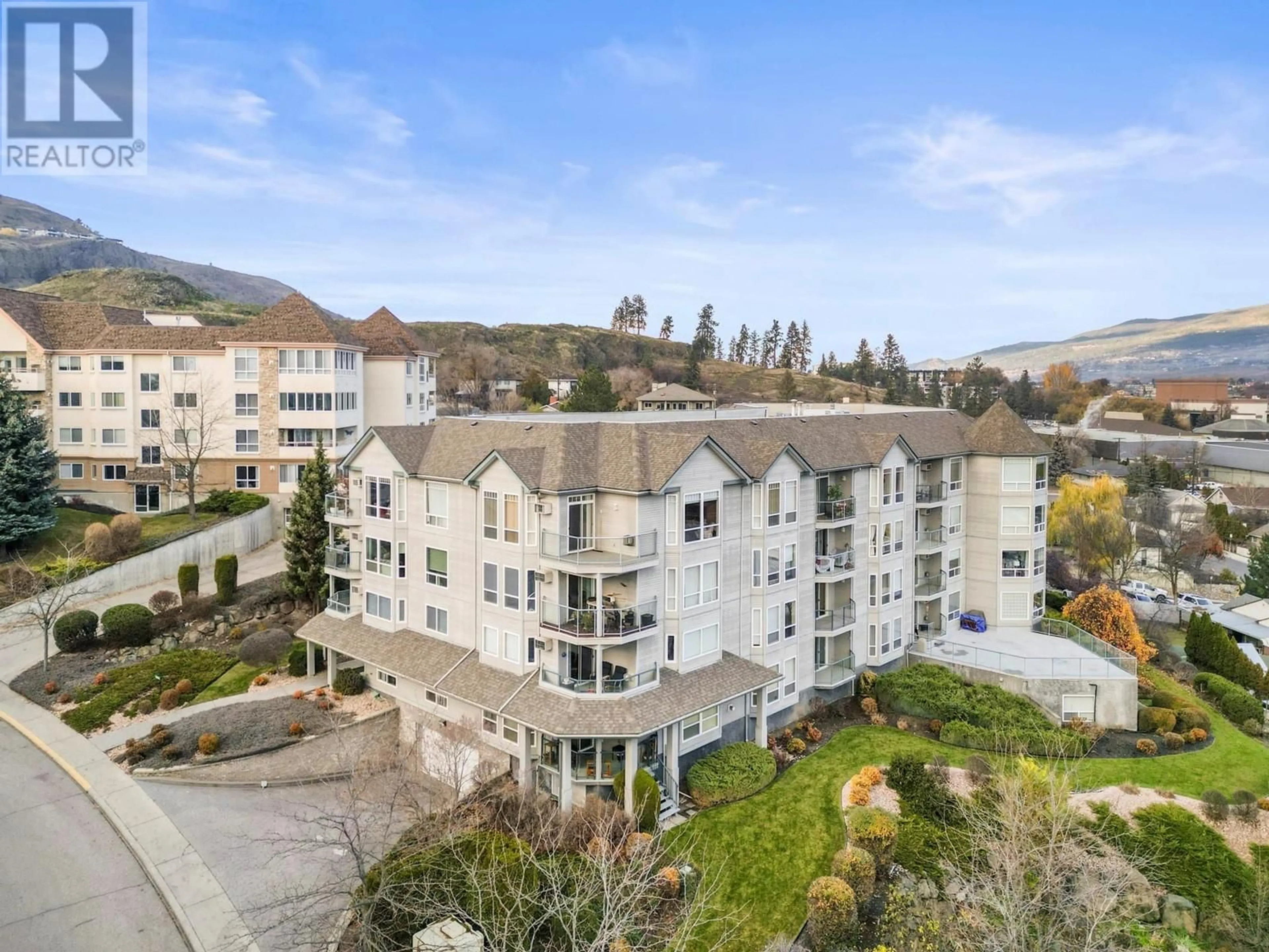 A pic from outside/outdoor area/front of a property/back of a property/a pic from drone, mountain view for 303 - 3221 CENTENNIAL DRIVE, Vernon British Columbia V1T2T8