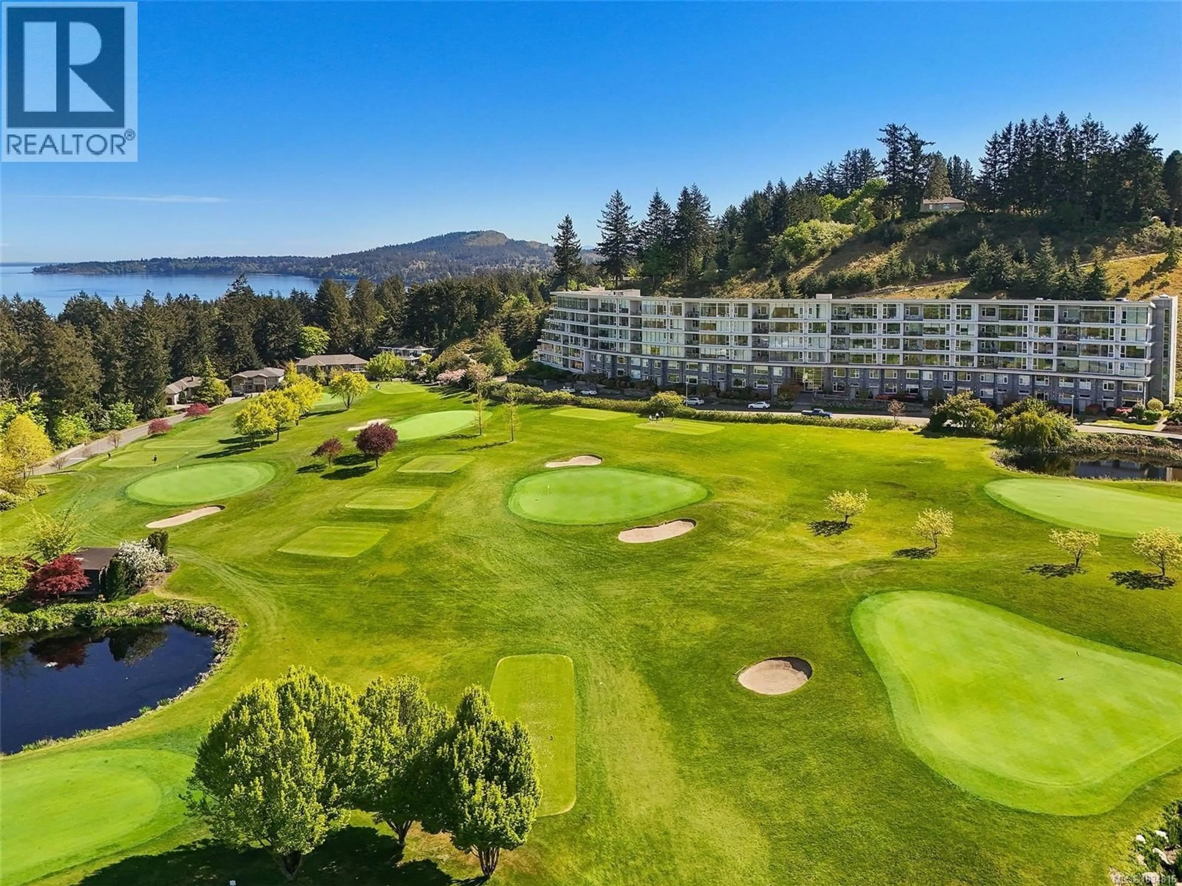 A pic from outside/outdoor area/front of a property/back of a property/a pic from drone, water/lake/river/ocean view for 607 - 5332 SAYWARD HILL CRESCENT, Saanich British Columbia V8Y3H8