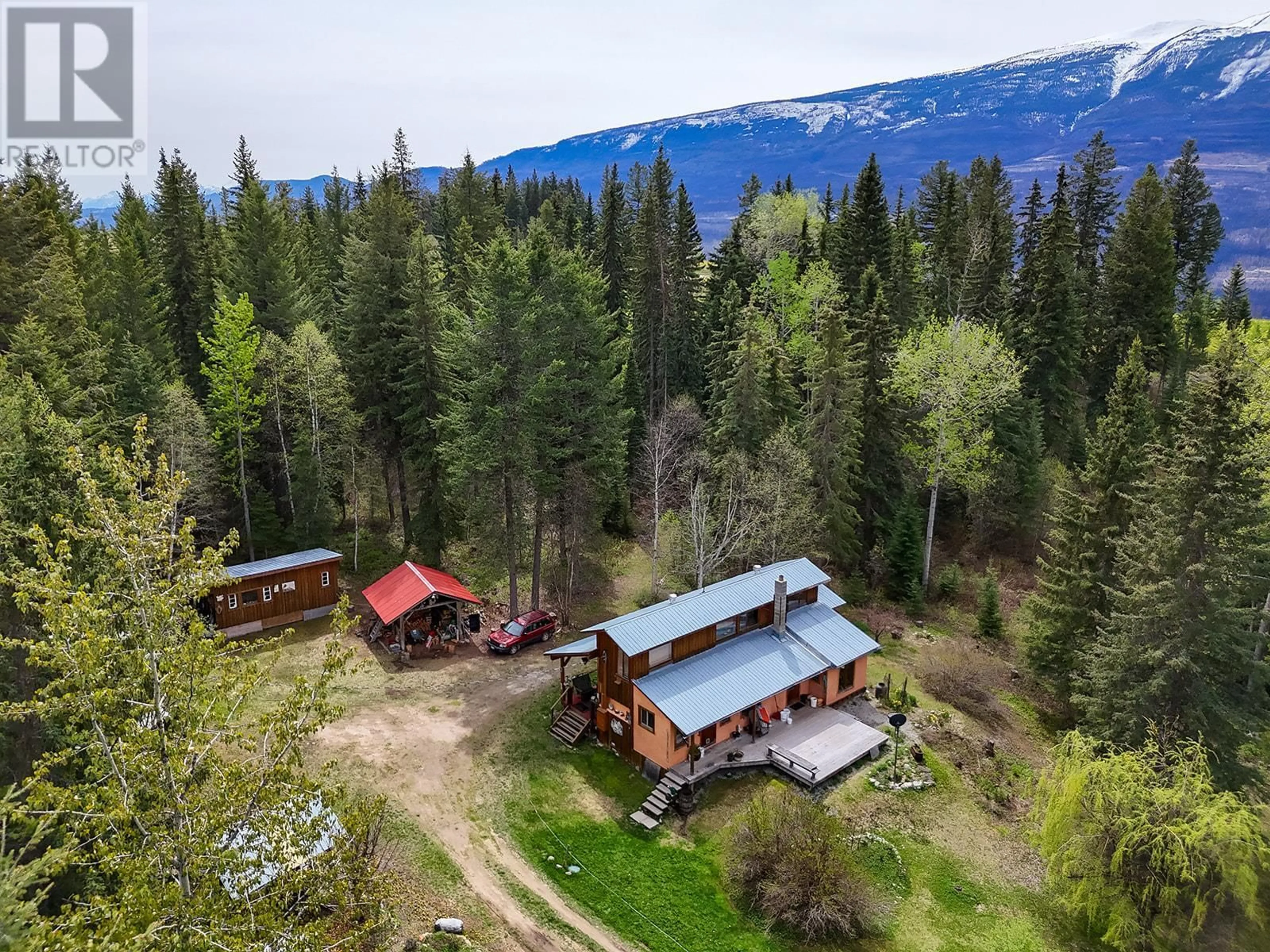 A pic from outside/outdoor area/front of a property/back of a property/a pic from drone, forest/trees view for 1, 2 & 3 - 2322 CAMPBELL ROAD, Golden British Columbia V0A1H7