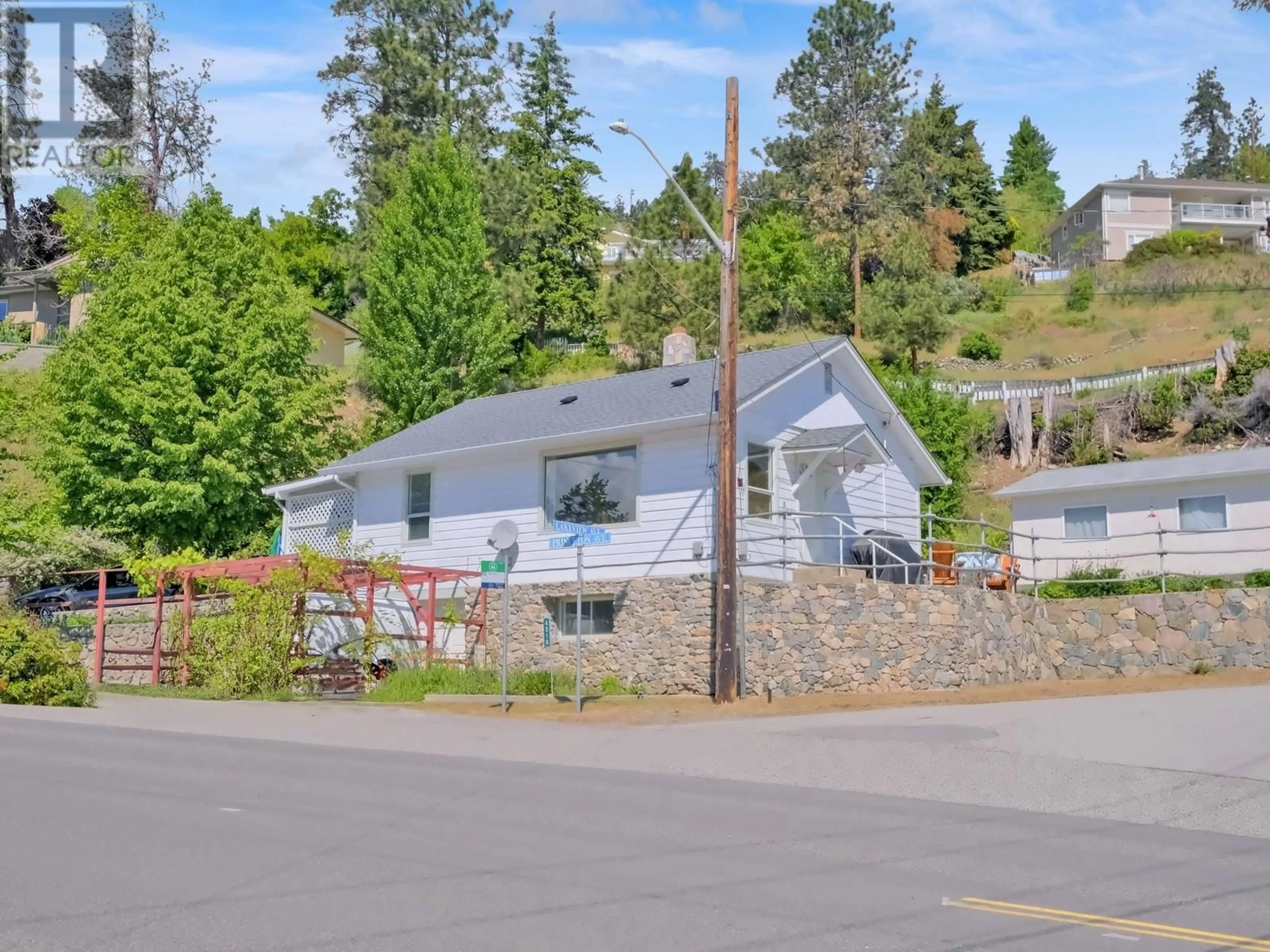 A pic from outside/outdoor area/front of a property/back of a property/a pic from drone, mountain view for 4516 PRINCETON AVENUE, Peachland British Columbia V0H1X4