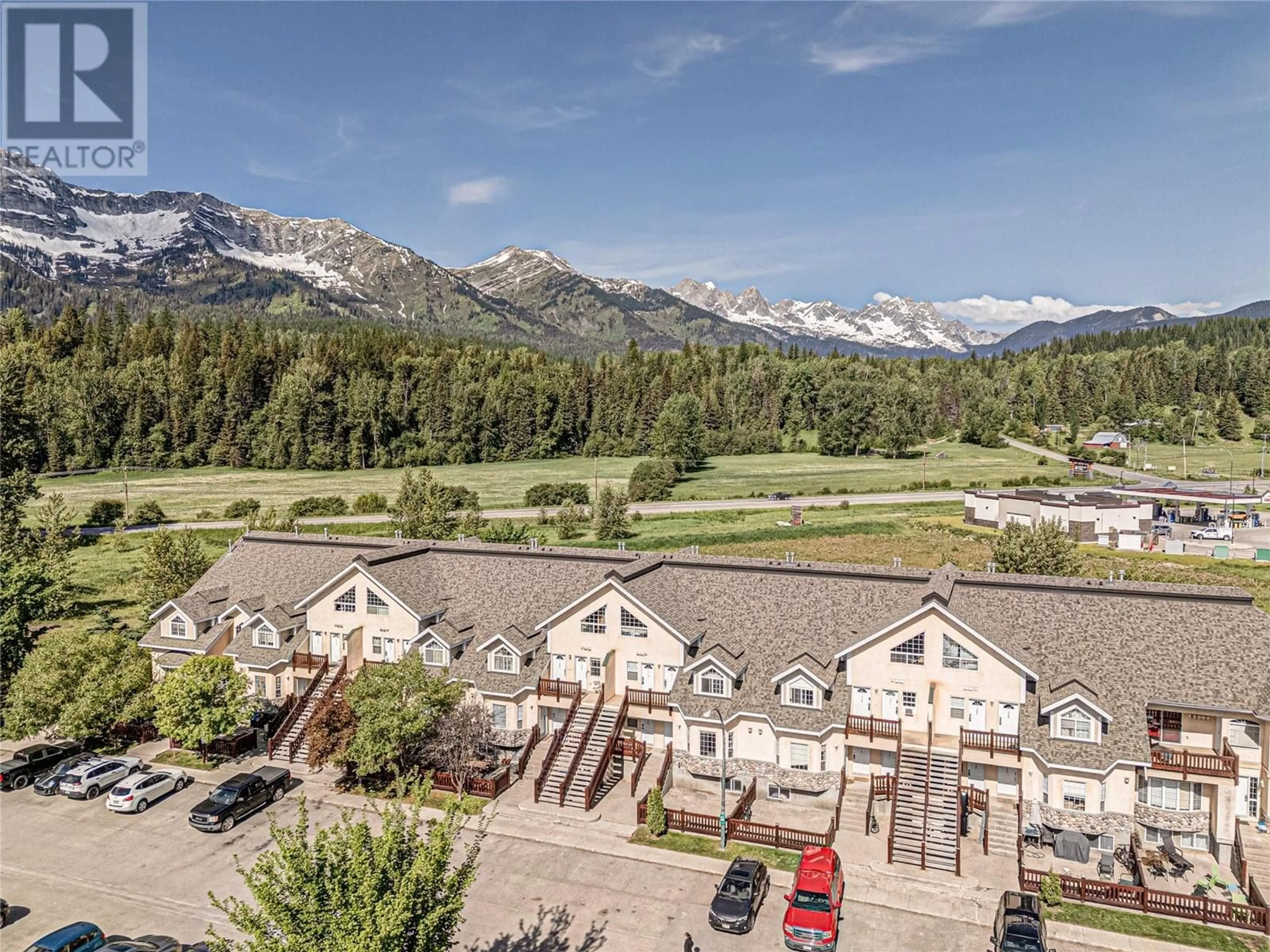 A pic from outside/outdoor area/front of a property/back of a property/a pic from drone, mountain view for 1216 - 1200 RIVERSIDE WAY, Fernie British Columbia V0B1M7