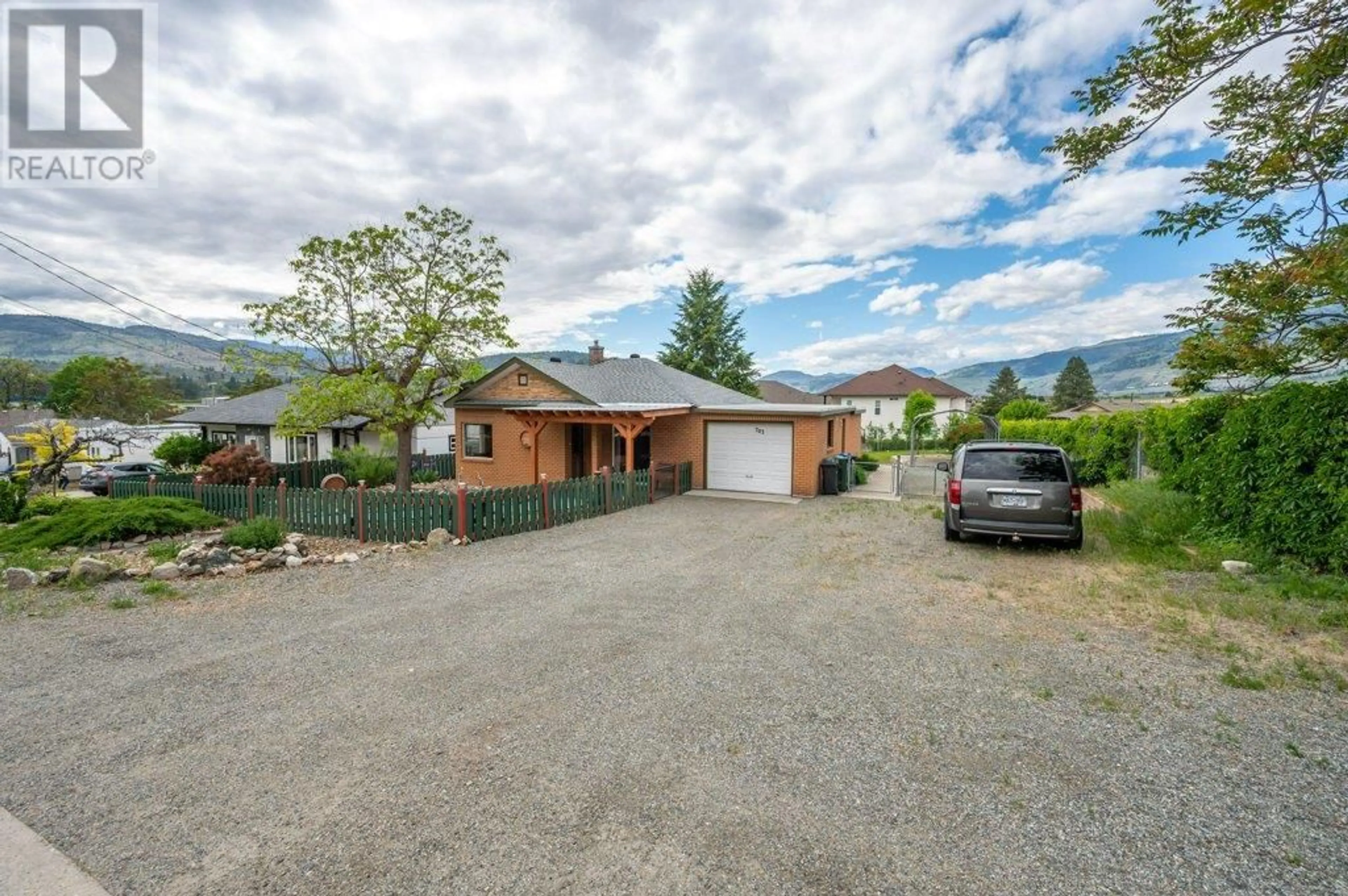 A pic from outside/outdoor area/front of a property/back of a property/a pic from drone, mountain view for 703 SIMILKAMEEN AVENUE, Oliver British Columbia V0H1T6