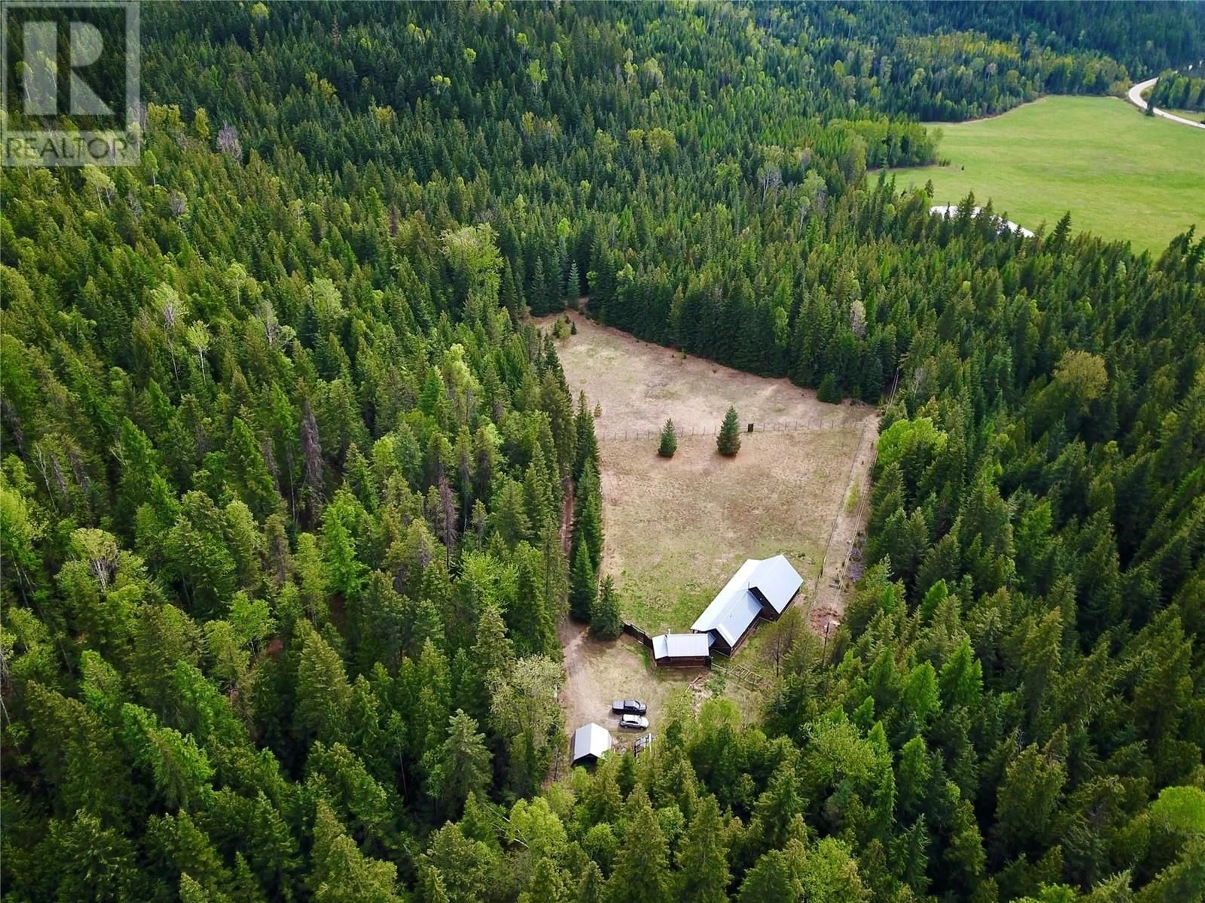 A pic from outside/outdoor area/front of a property/back of a property/a pic from drone, forest/trees view for 152 TALBOT ROAD, Salmo British Columbia V0G1Z0