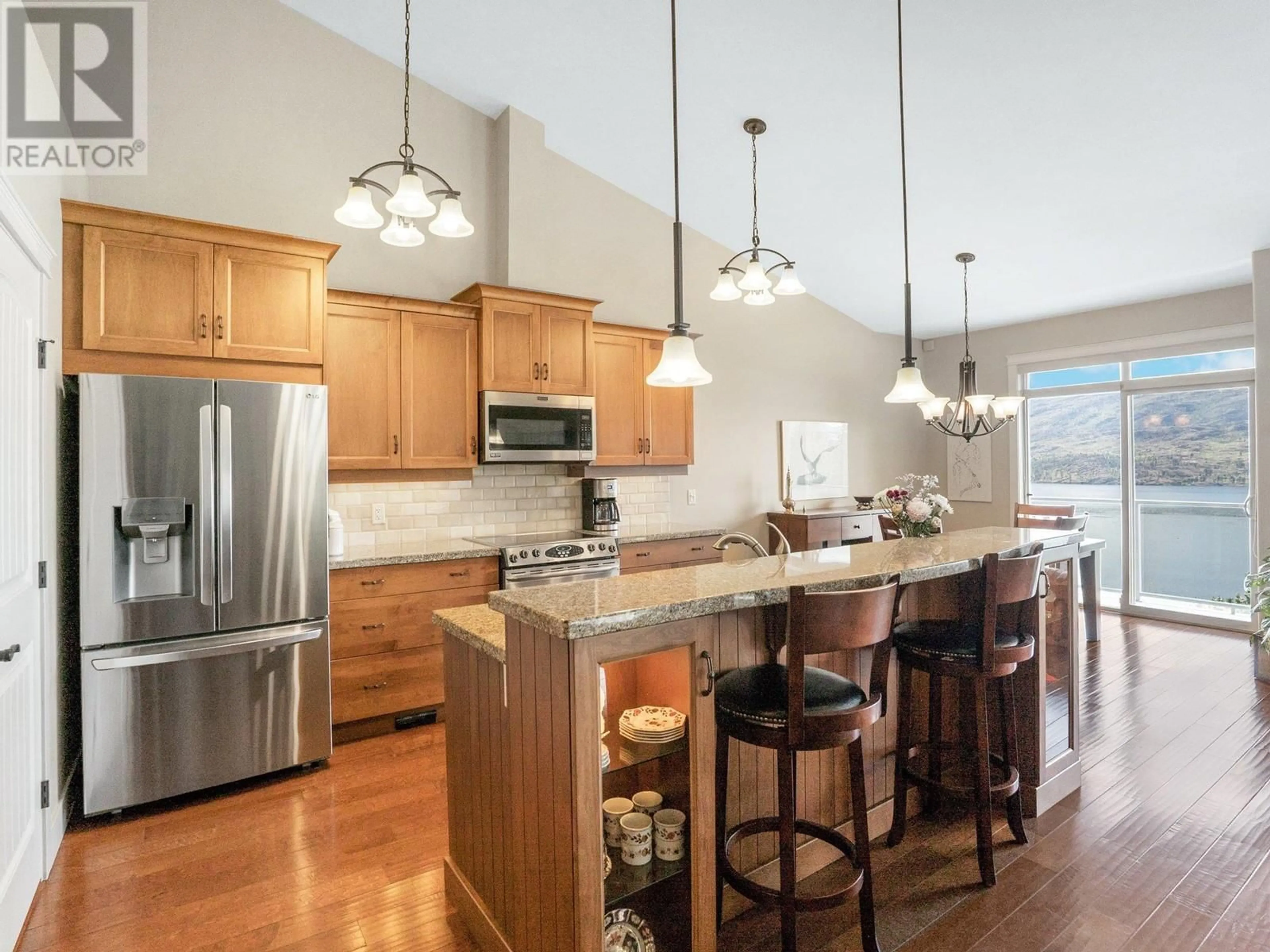 Open concept kitchen, wood/laminate floor for 248 - 4350 PONDEROSA DRIVE, Peachland British Columbia V0X1X5