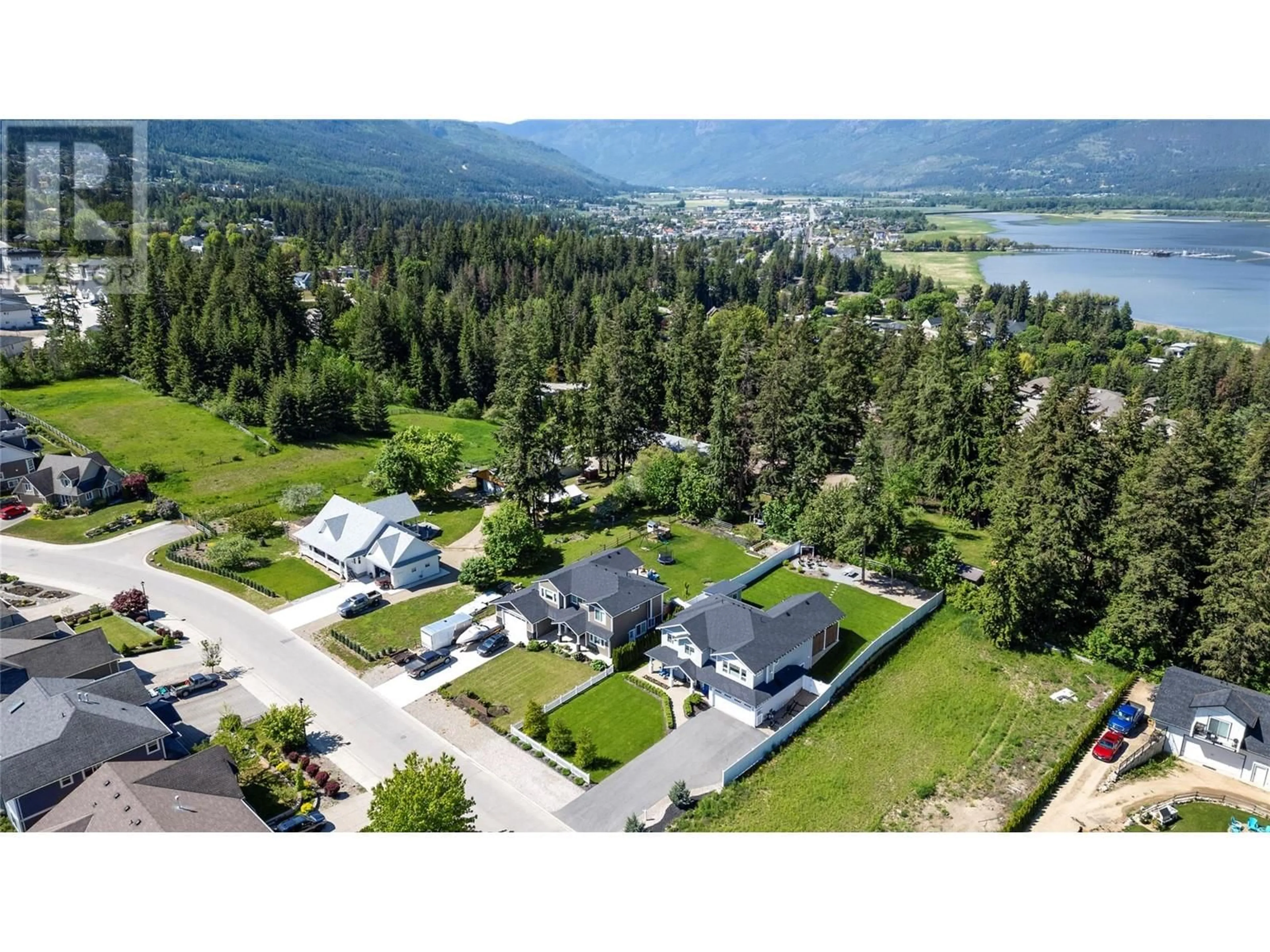 A pic from outside/outdoor area/front of a property/back of a property/a pic from drone, mountain view for 1811 22 STREET NORTHEAST, Salmon Arm British Columbia V1E3M9