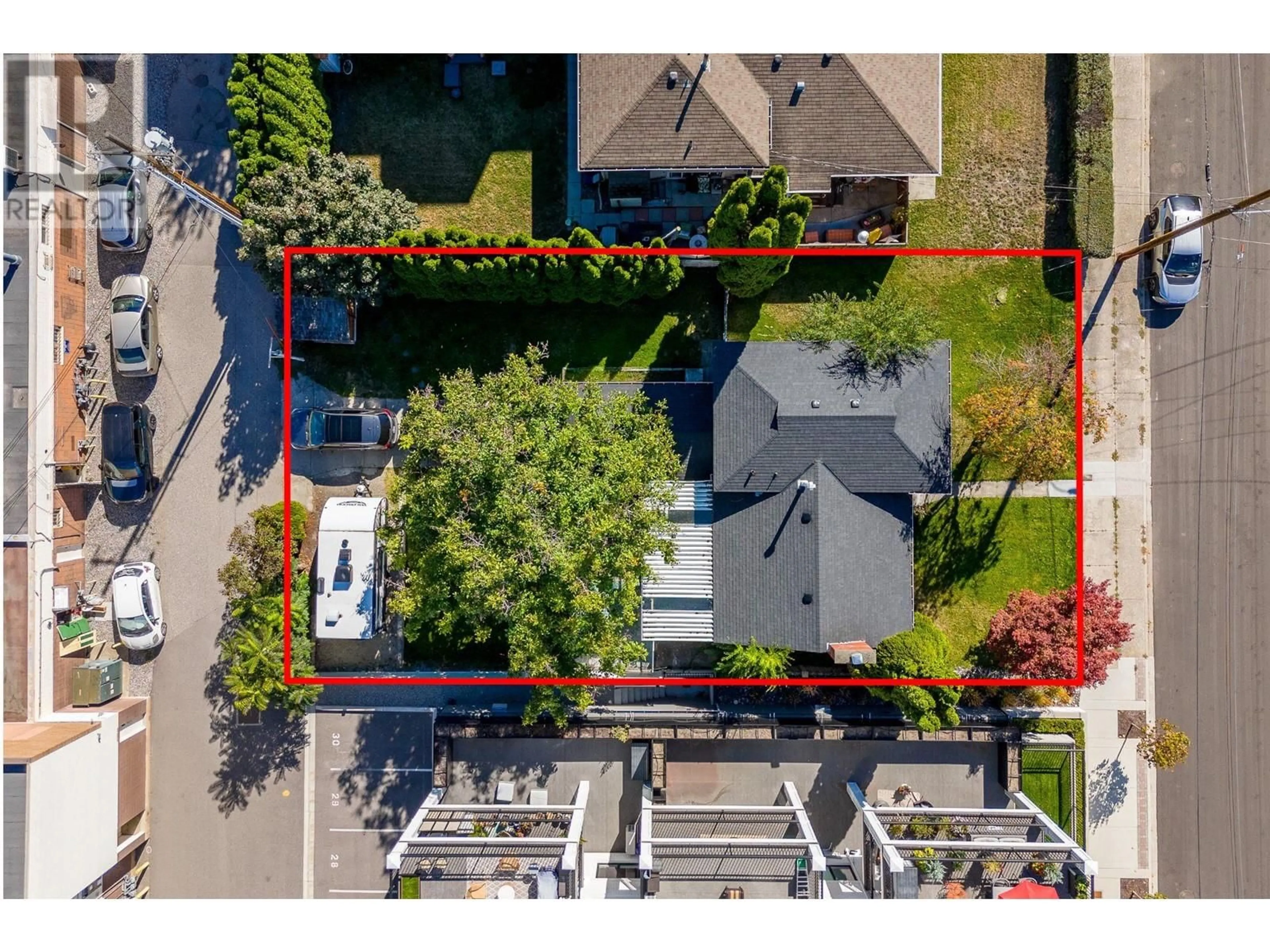 A pic from outside/outdoor area/front of a property/back of a property/a pic from drone, street for 2653 GORE STREET, Kelowna British Columbia V1Y1M6